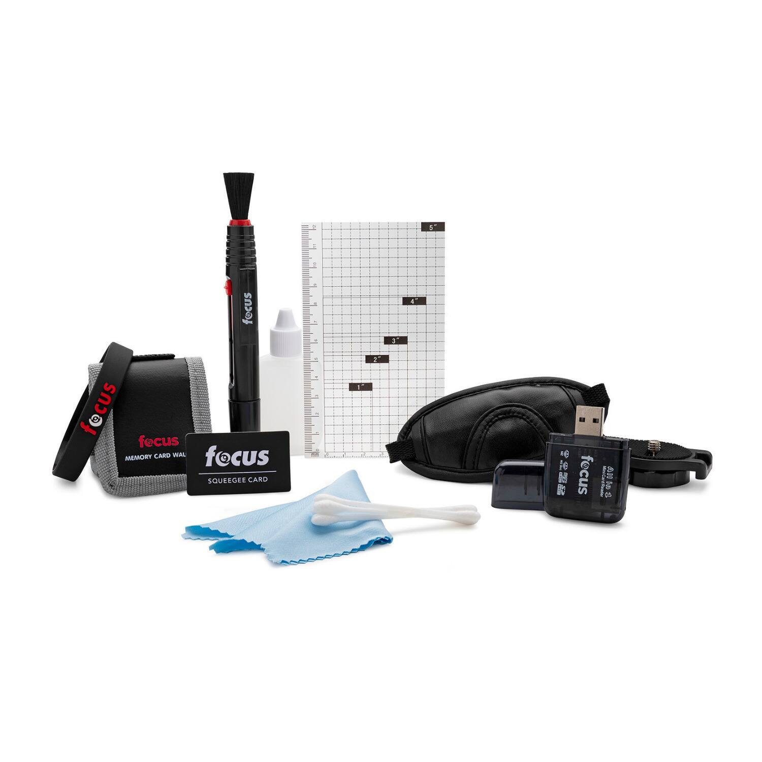 The image shows a collection of items, including a memory card, a squeegee card, a focus pad, a pen, and a small bottle. These items are placed on a white background, making them stand out. The memory card is positioned to the left of the squeegee card, while the focus pad is located to the right of the memory card. The pen is placed above the memory card, and the small bottle is situated below the pen. The arrangement of these items suggests that they are part of a kit or a collection for a specific purpose or activity.