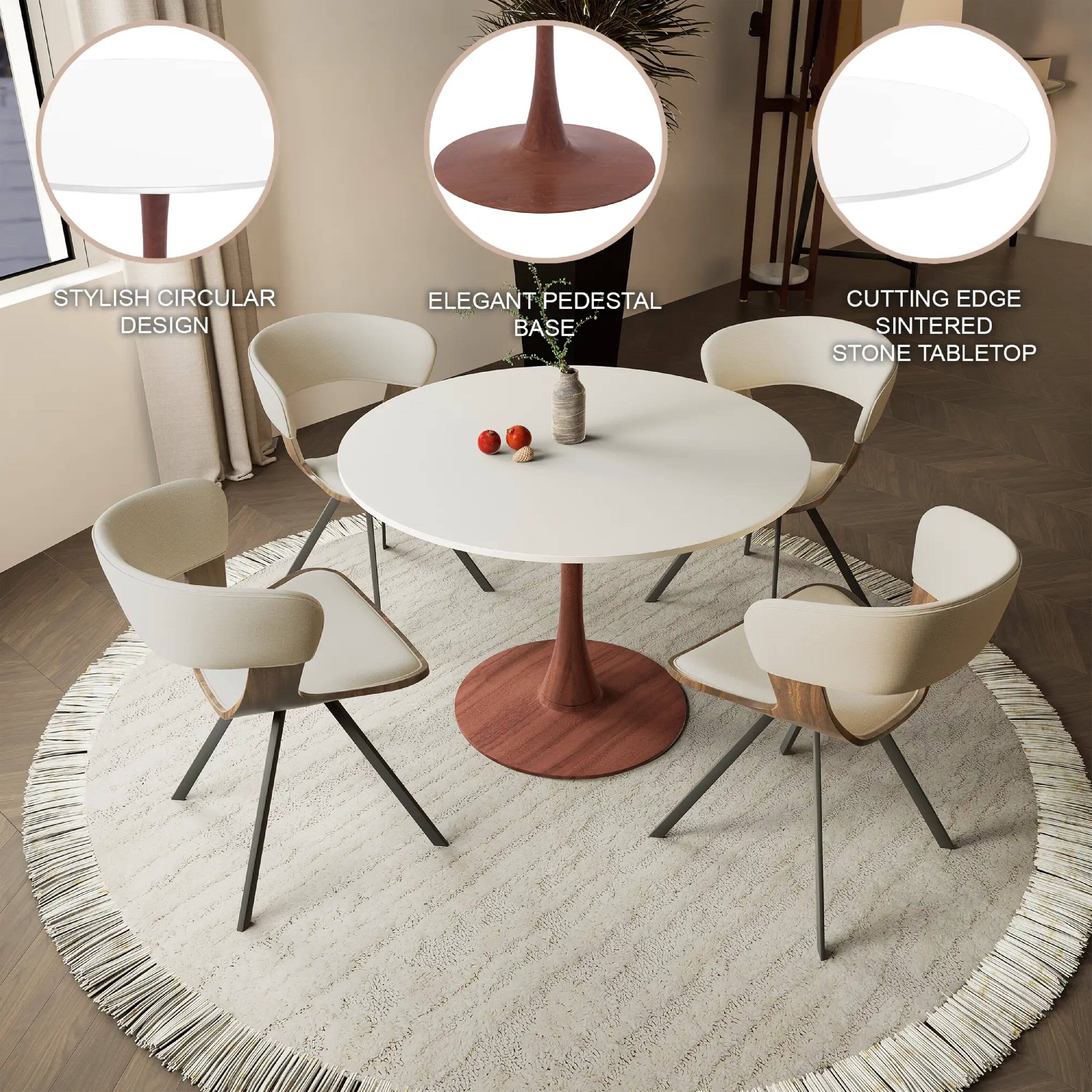 STYLISH CIRCULAR DESIGN  
ELEGANT PEDESTAL BASE  
CUTTING EDGE SINTERED STONE TABLETOP