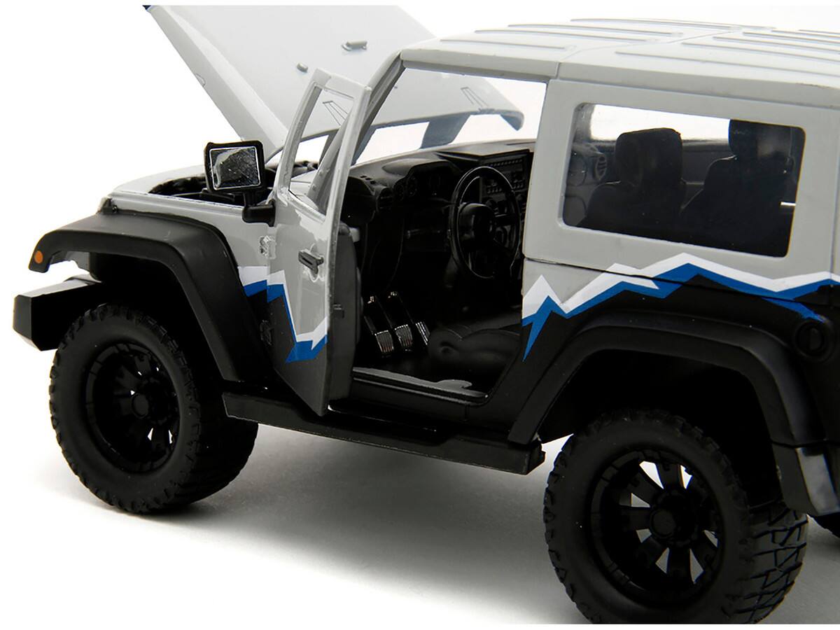 Back. Jada - 2007 Jeep Wrangler Gray and Black with Blue and White Stripes with Extra Wheels "Just Trucks" Series 1/24 - Gray and Black.