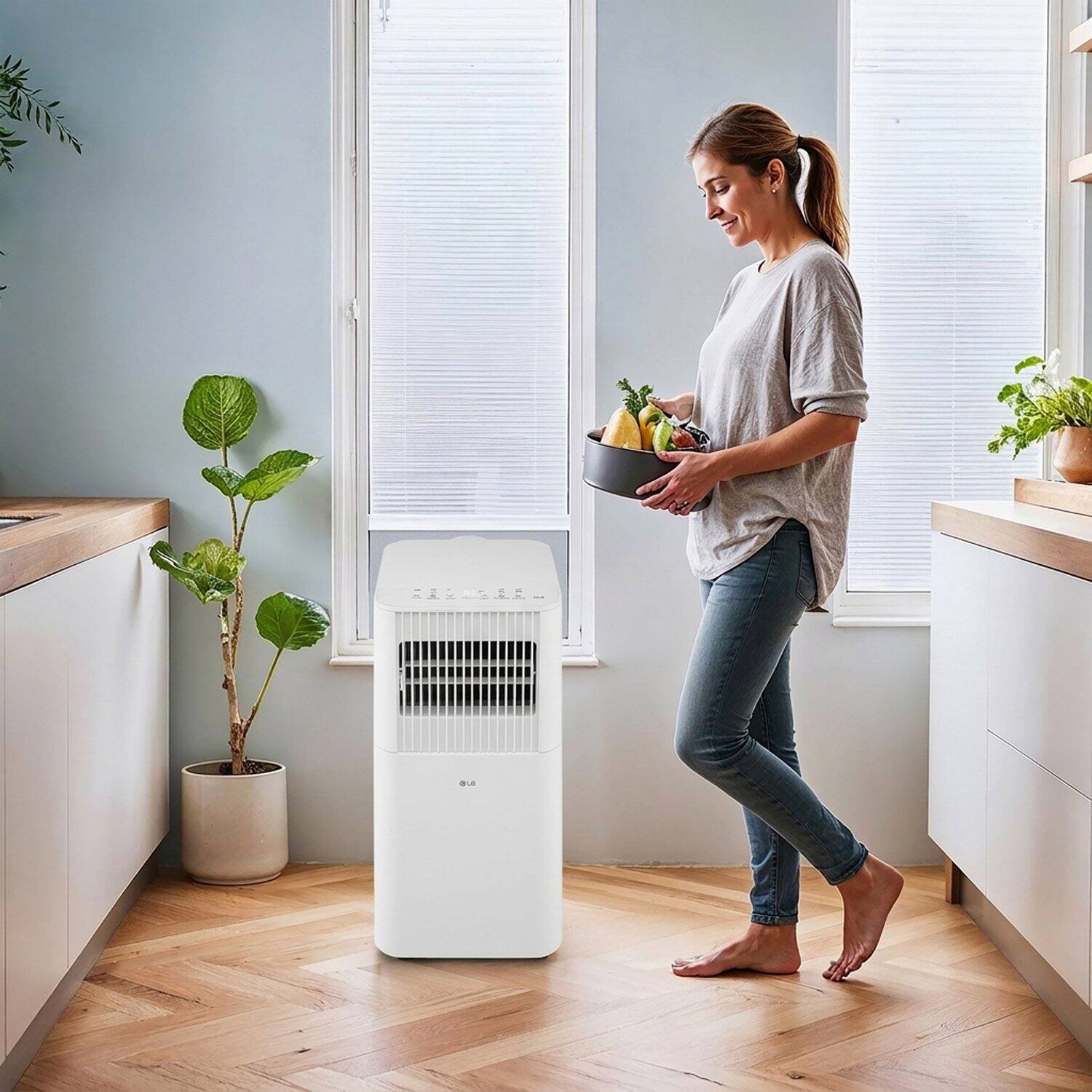 Alt View 23. LG - 6,000 BTU DOE (8,000 BTU ASHRAE) 250 Sq. Ft. White Portable Air Conditioner with Remote - White.