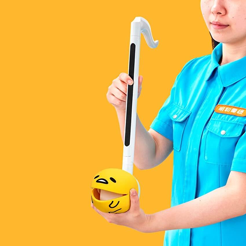 Back. Otamatone - Otamatone Synthesizer Music Toy Instrument with Sanrio Characters Deluxe Size Licensed English Manual - Gudetama.
