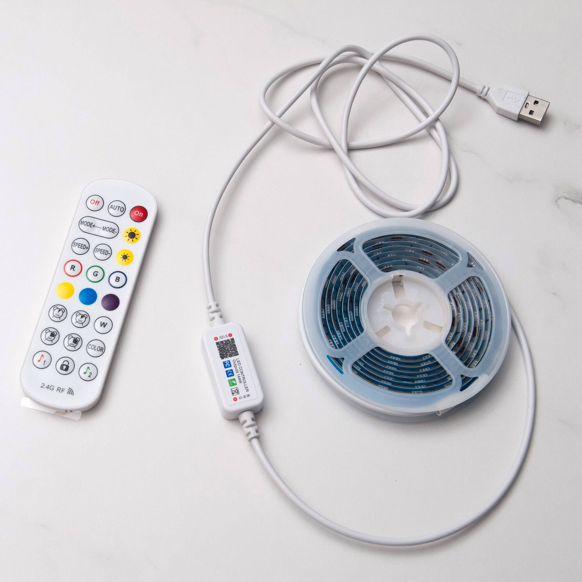 Sure, here is the corrected and grouped text from the image:

**Remote Control:**
- On
- Off
- Auto
- Mode+
- Mode-
- Speed+
- Speed-
- R
- G
- B
- W
- Color
- 2.4G RF

**Receiver:**
- 2.4G RF
- (QR Code)
- (Icons for different modes or settings)

**Fan:**
- (No visible text)

**USB Adapter:**
- (No visible text)