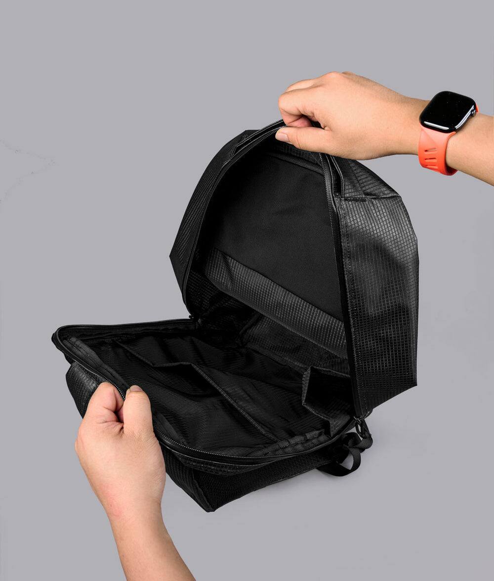Left. ALPAKA - Lightweight 22L Laptop Backpack for 16-inch Laptop, Momentum Backpack for Work, Travel & Commuting, Weather-Resistant - Axodyne hybrid Black.