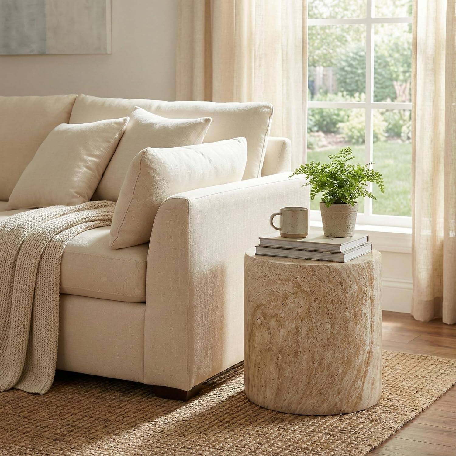 Angle. LeisureMod - Vintara 18" Modern Cylindrical Round Fiberstone Side Table, Accent End Table with Floor Protection for Living Room - Travertine.