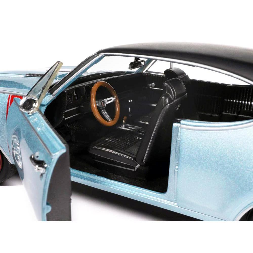 Back. Autoworld - 1968 Oldsmobile 442 W30 Holiday Coupe Teal Frost Metallic with Red Stripes Black Vinyl Top Hemmings Cover 1/18 - Blue.