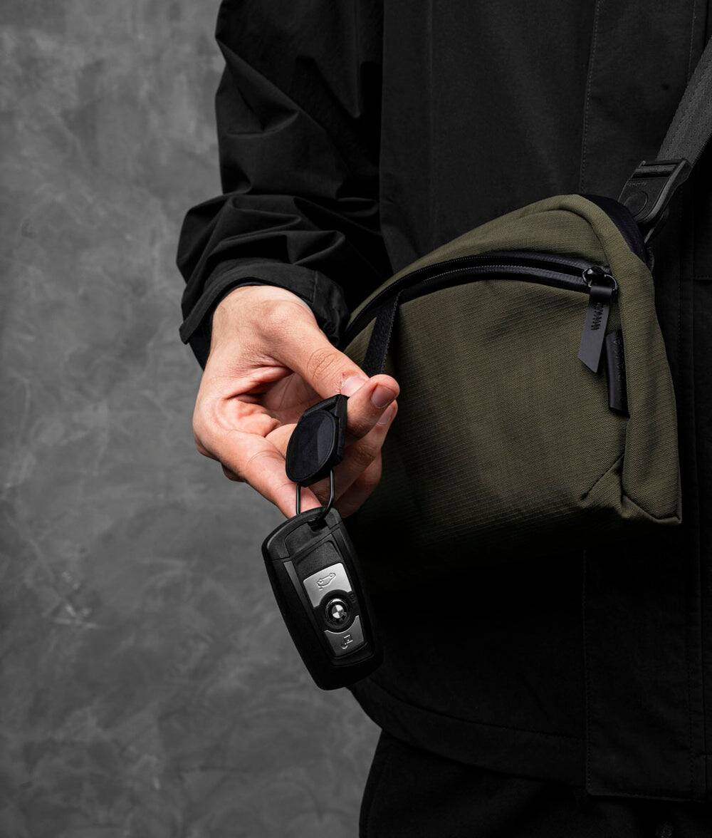 Alt View 1. ALPAKA - ALPAKA Flight Sling 2L Lightweight Packable Travel Sling Bag with Tablet Sleeve and Detachable Strap - Green/Grey Axoflux 400D.