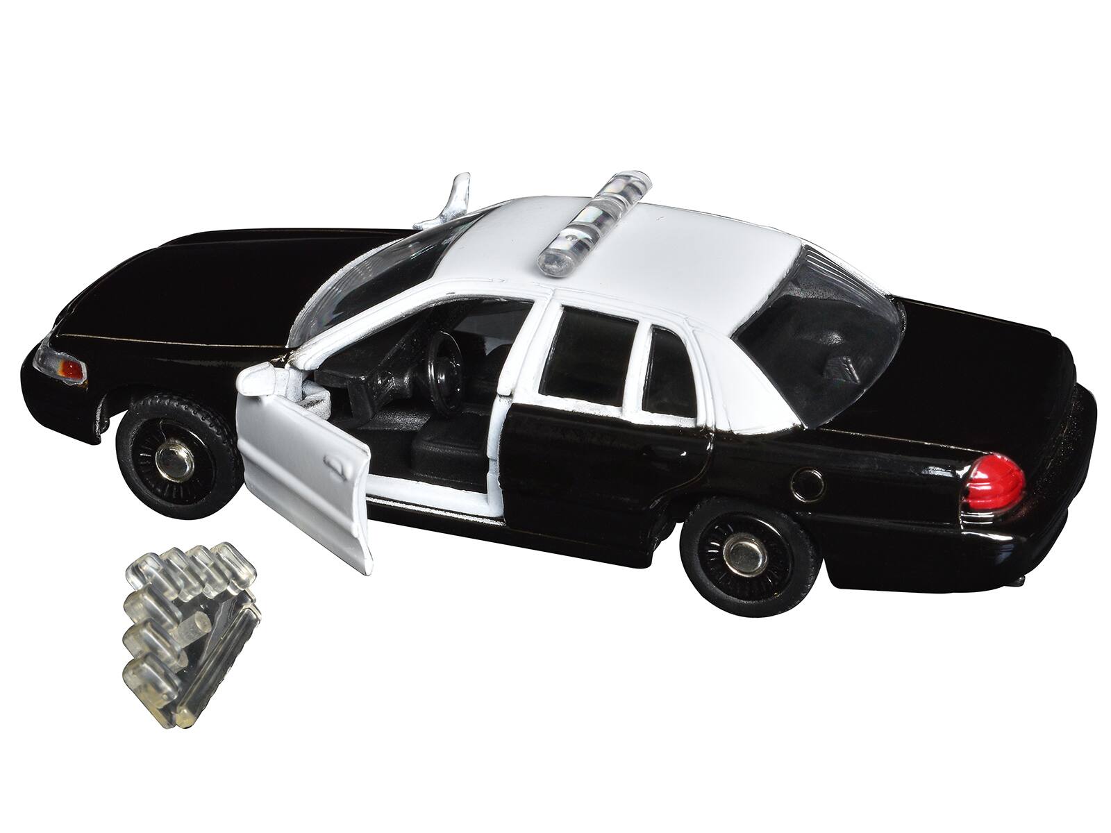 Angle. Motormax - Ford Crown Victoria Police Interceptor Black and White 1/43 Diecast Model Car by Motormax - Black And White.