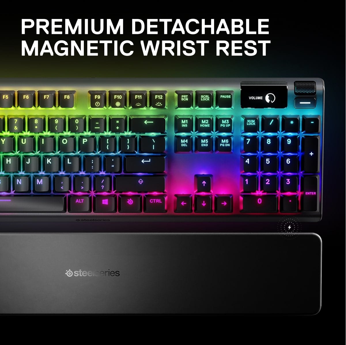 The image shows a premium detachable magnetic wrist rest keyboard, which features a colorful design with rainbow colors. The keyboard has a unique design, with a detachable wrist rest that can be easily removed for cleaning or storage. The keyboard also includes a magnetic wrist rest, which adds comfort and support for the user's wrists while typing. The keyboard is equipped with various keys, including function keys, arrow keys, and a numeric keypad. The keyboard is manufactured by steelseries, a well-known brand in the gaming industry.
