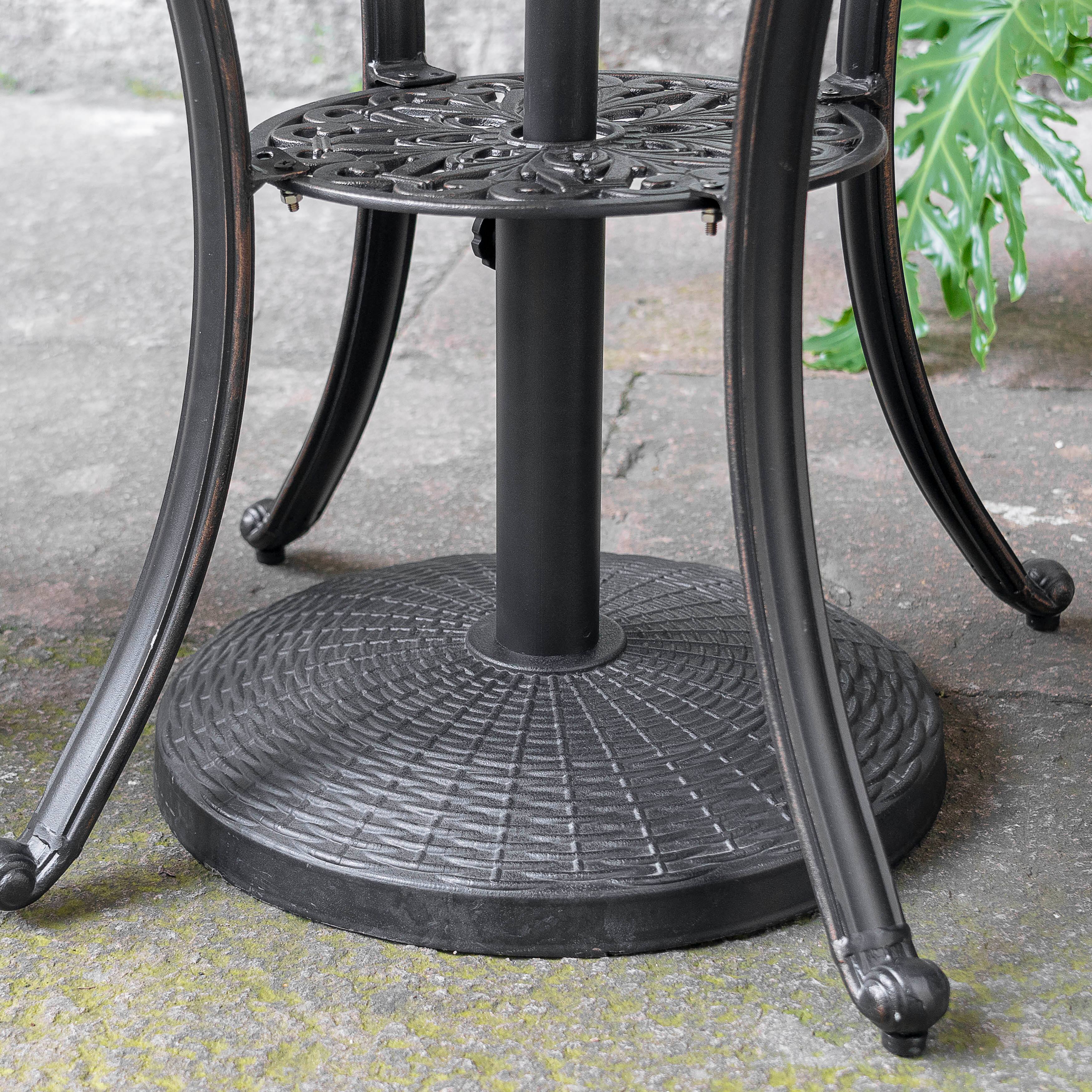 Left. Nuu Garden - Outdoor 22 lb. Round Black Patio Umbrella Base, Resin and Concrete - Black.