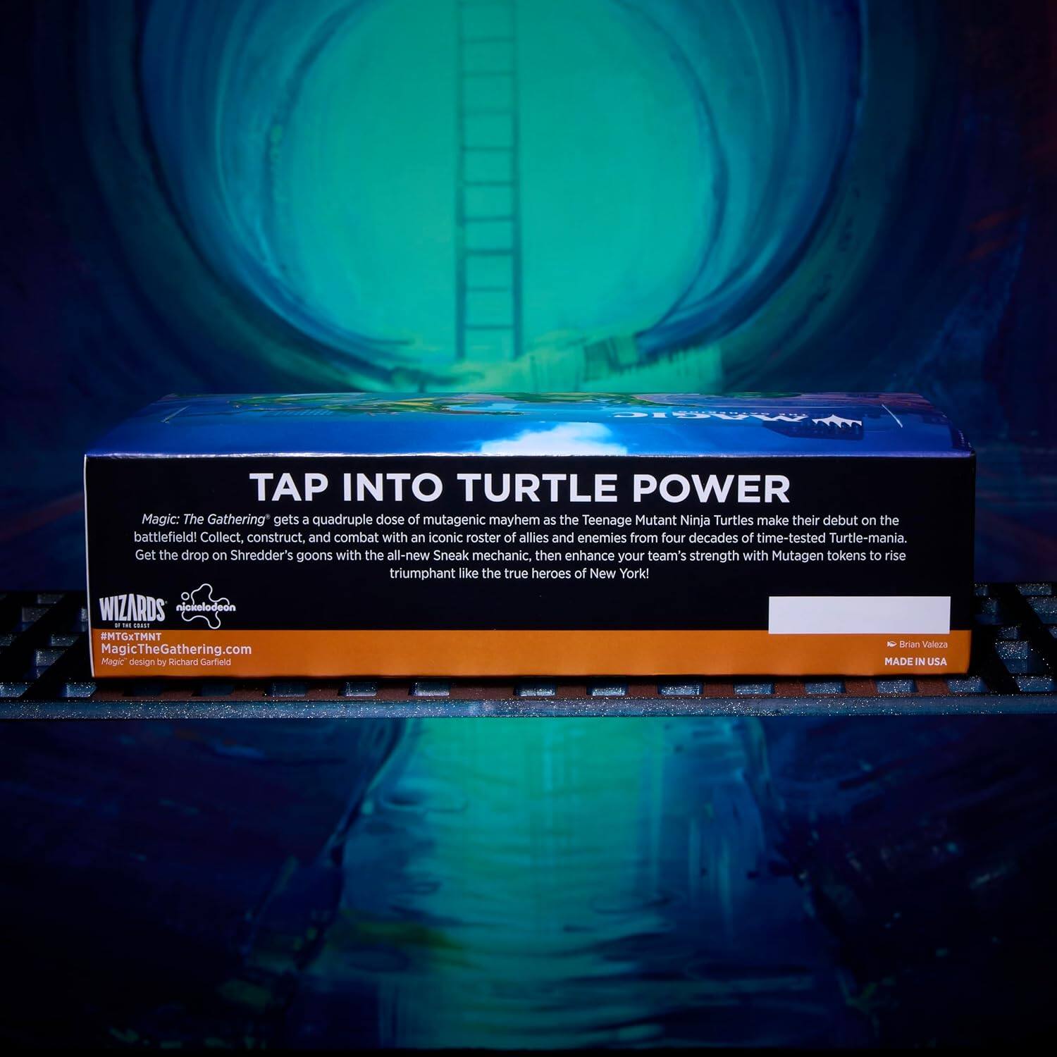 TAP INTO TURTLE POWER

Magic: The Gathering gets a quadruple dose of mutagenic mayhem as the Teenage Mutant Ninja Turtles make their debut on the battlefield! Collect, construct, and combat with an iconic roster of allies and enemies from four decades of time-tested Turtle-mania. Get the drop on Shredder's goons with the all-new Sneak mechanic, then enhance your team's strength with Mutagen tokens to rise triumphant like the true heroes of New York!

WIZARDS nickelladoon CREAT #MTGxTMNT Brian Valeza MagicTheGathering.com Magic design by Richard Garfield MADE IN USA