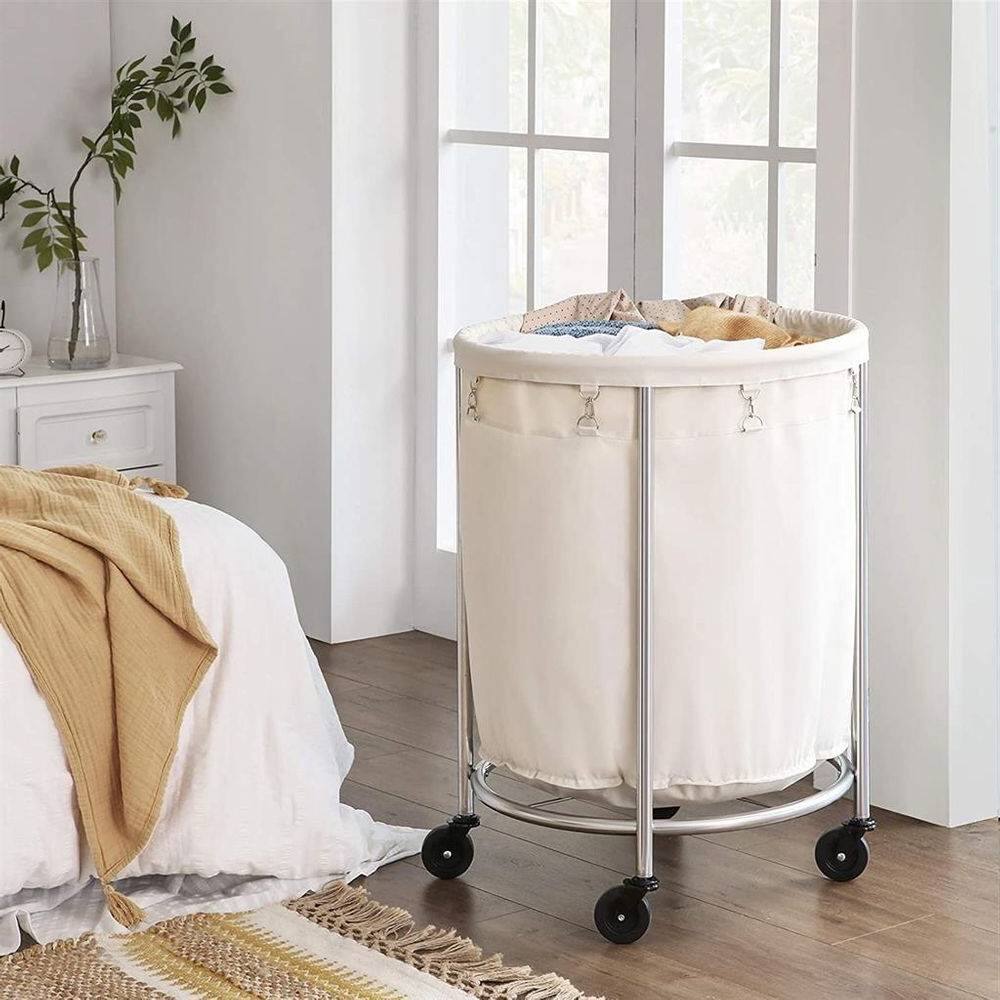Angle. Hivvago - Round 45-Gallon Laundry Basket Hamper w/ Cream Fabric Bag Steel Frame on Wheels - Cream, Silver.