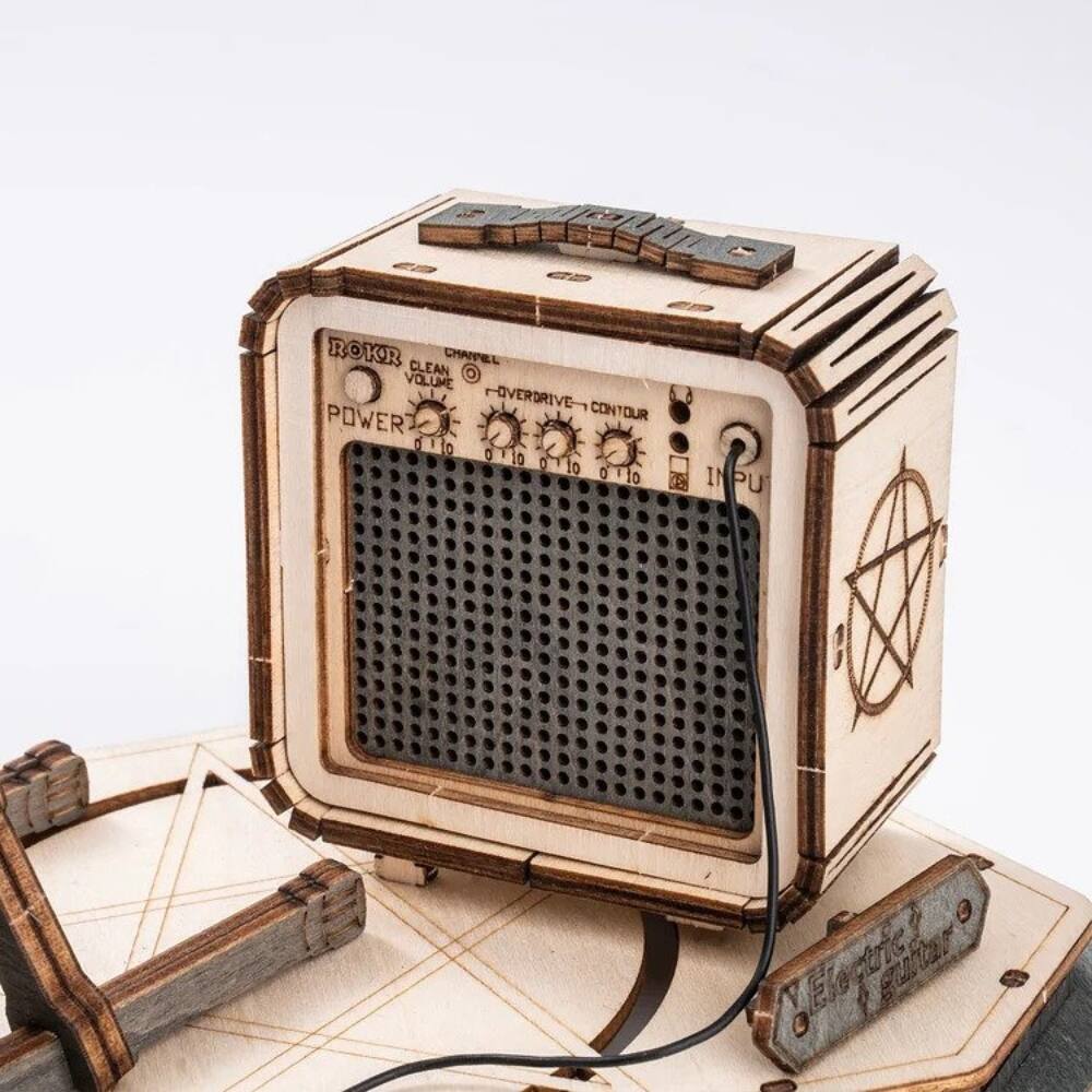 ROKR  
CHANNEL VOLUME  
CLEAN  
OVERDRIVE  
POWER  
DRIVE  
CONTOUR  
INPUT  

Electric Guitar