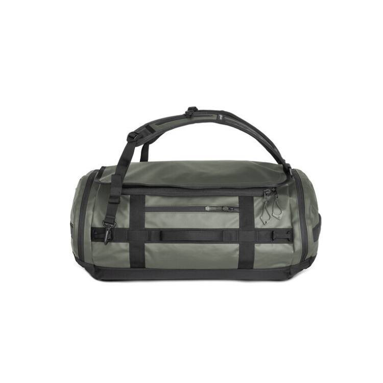Front. WANDRD - WANDRD CARRYALL Duffel with Expandable Bottom Compartment (Wasatch Green, 60L) - Green.