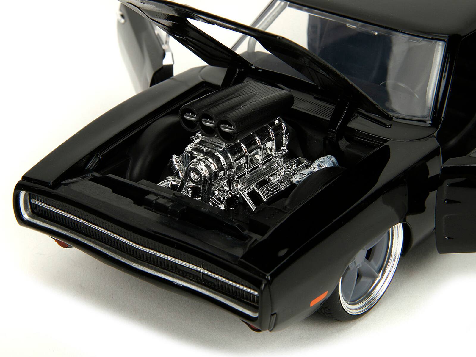 Left. Jada - 1970 Dodge Charger R/T Black "Fast X" (2023) Movie "Fast & Furious" Series 1/24 Diecast Model Car by Jada - Black .