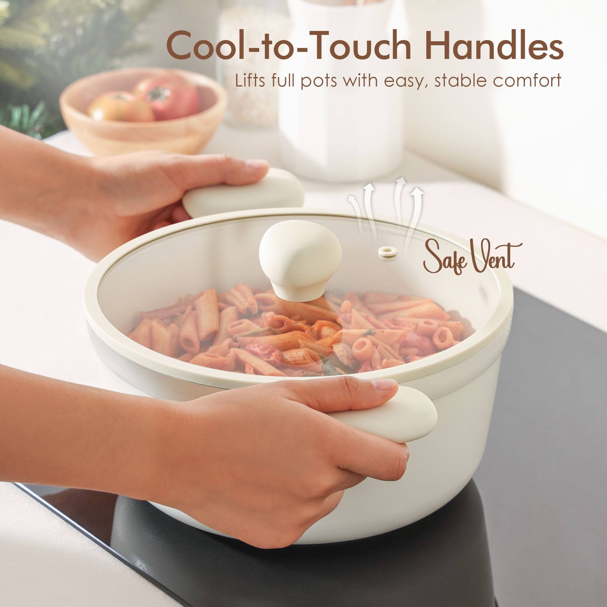 Cool-to-Touch Handles  
Lifts full pots with easy, stable comfort  
Safe Vent