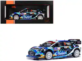 Ford Puma Rally1 #13 Gregoire Munster - Louis Louka "Central European Rally" (2023) 1/18 Diecast Model Car by IXO Models - Multicolor