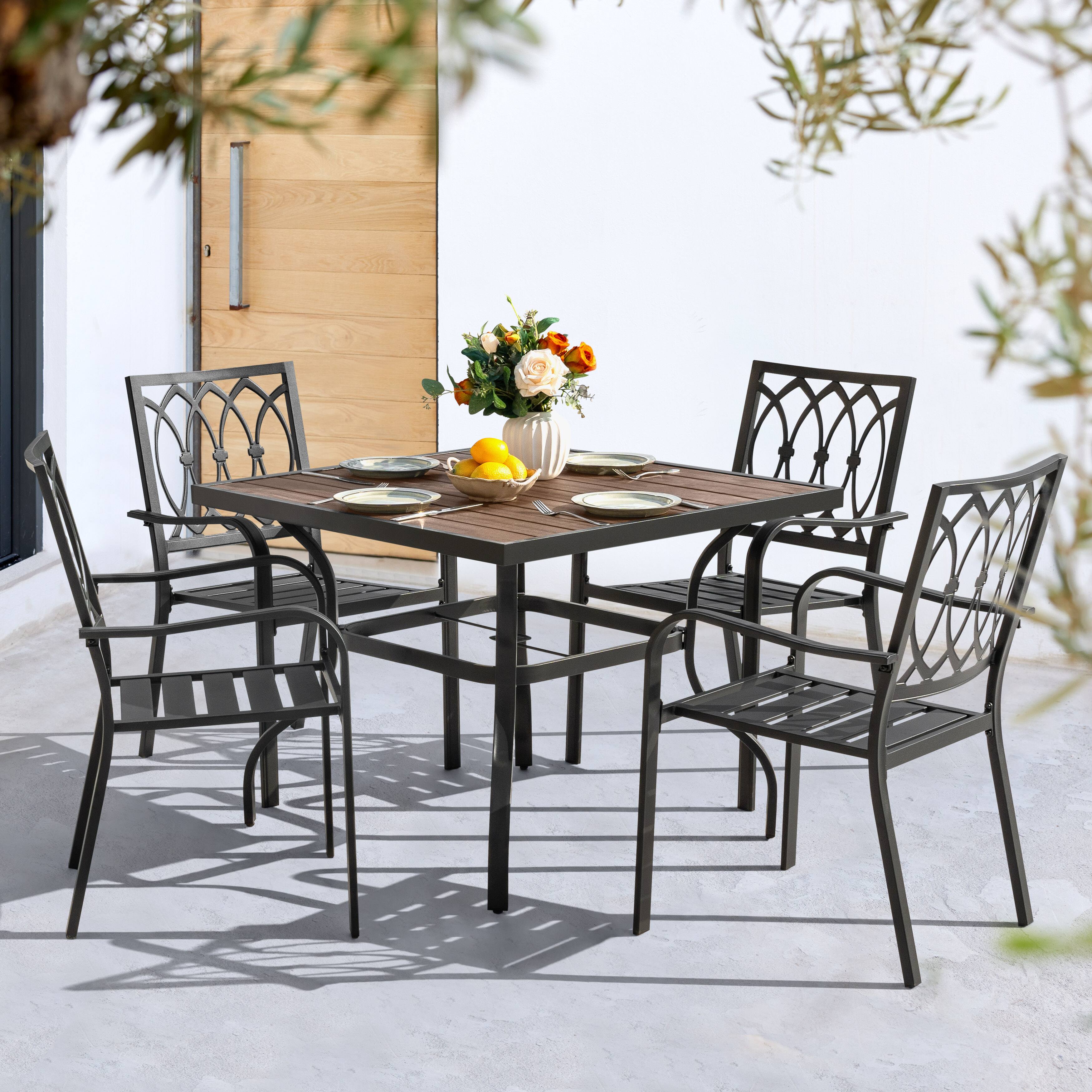 Angle. Nuu Garden - 5PCS Patio Dining Set with Umbrella Hole, Faux Wood Top, Stackable Design - Black and Brown.