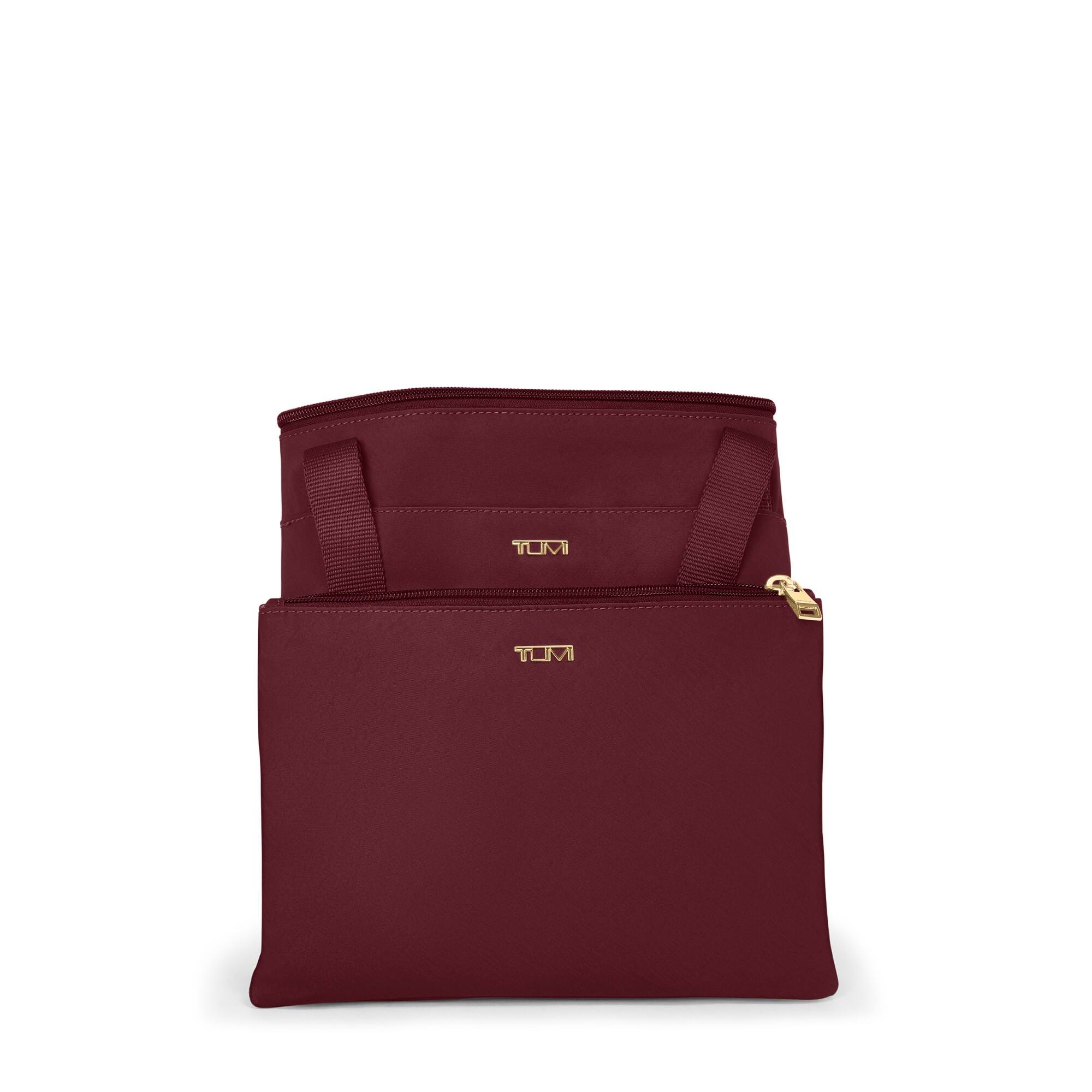 The text on the image is "TOMI TOMI".