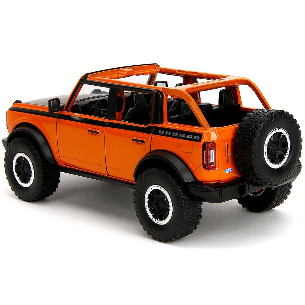 Alt View 1. Jada - 2021 Ford Bronco Open-Top Orange with Black Stripes and Hood with Extra Wheels "Just Trucks" Series 1/24 - Orange with Black Stripes.