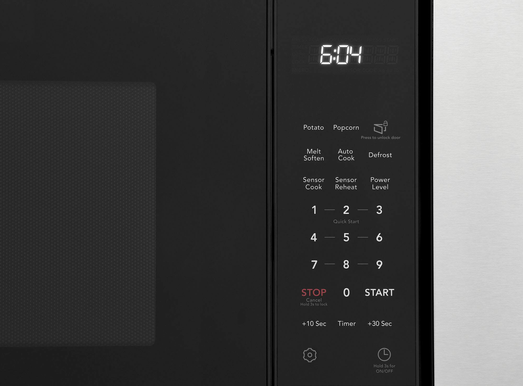 The text on the image reads:

6:04 a Potato Popcorn Press to unlock door Melt Soften Auto Cook Defrost Sensor Sensor Cook Reheat Power Level 1 2 Quick Start 3 4 | 5  6 7 8  9 STOP Cancel Hold 3s te ock 0 START +10 Sec Timer +30 Sec Hold 3e for ON/OFF

Corrected text:

6:04 a Potato Popcorn Press to unlock door Melt Soften Auto Cook Defrost Sensor Sensor Cook Reheat Power Level 1 2 Quick Start 3 4 | 5  6 7 8  9 STOP Cancel Hold 3s te ock 0 START +10 Sec Timer +30 Sec Hold 3e for ON/OFF