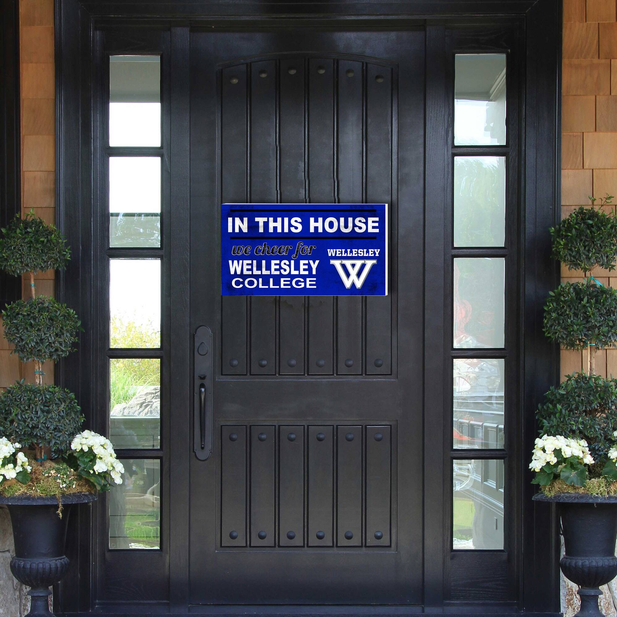 IN THIS HOUSE  
we cheer for  
WELLESLEY COLLEGE  
WELLESLEY W