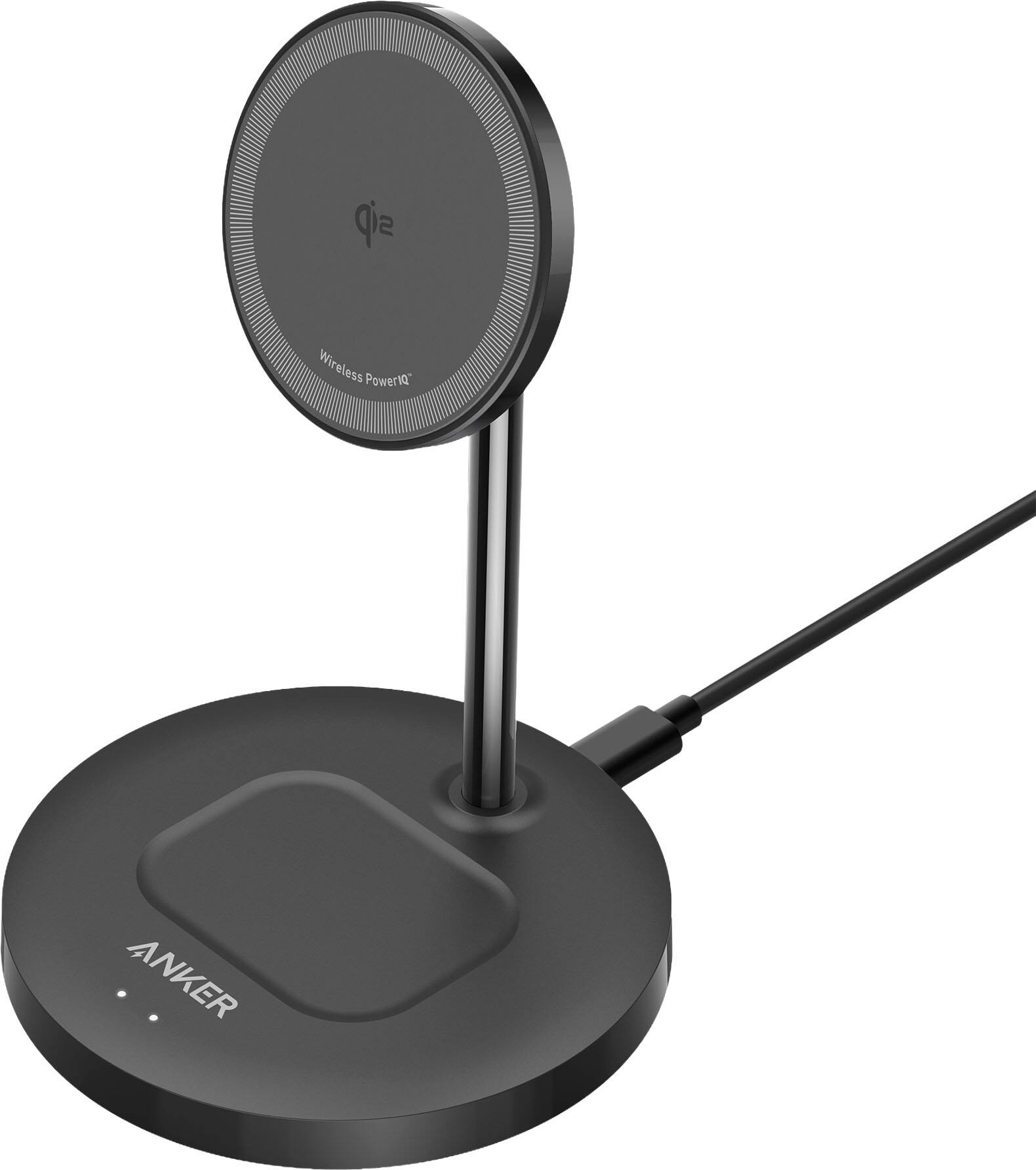 The image features a black microphone stand with a microphone attached to it. The microphone is placed on a black base, and there is a cord plugged into the base. The stand is designed to hold the microphone securely and provide a stable platform for recording or speaking. The microphone itself is a small, circular device that captures sound and transmits it to a connected device, such as a computer or a smartphone. The stand is likely used in various settings, such as recording studios, conference rooms, or even personal homes, to enhance the quality of audio recordings or facilitate clear communication during video calls or meetings.