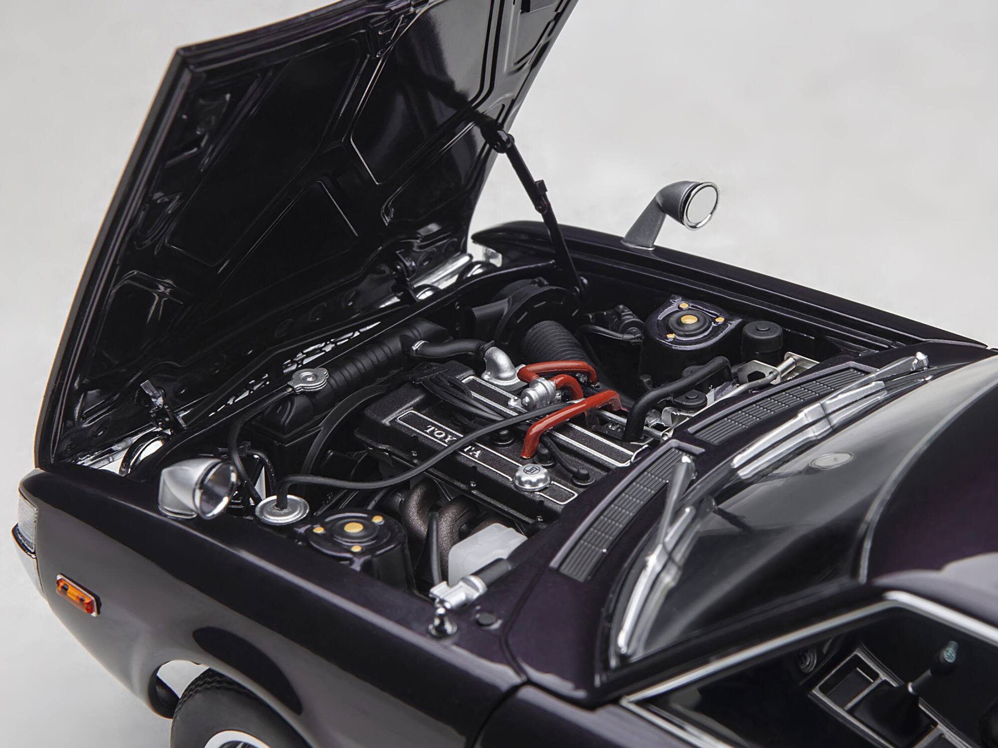 Alt View 2. Autoart - 1973 Toyota Celica Liftback 2000GT (RA25) RHD (Right Hand Drive) Dark Purple Metallic 1/18 Model Car by Autoart.