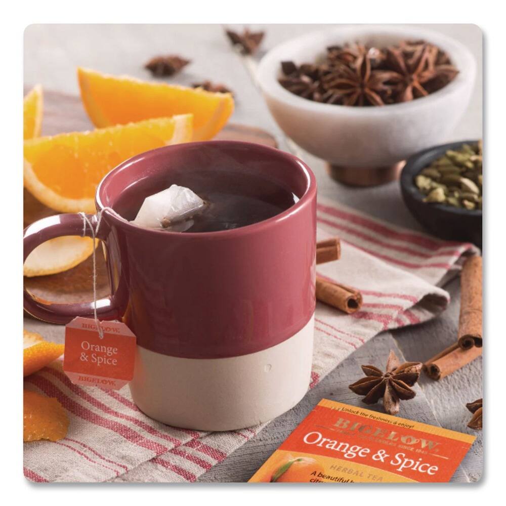 IR HIGLOW & Orange Spice HIGLOW. Unlock the freshness of a beautiful Orange BIGELOW. BLENDERS KINCE OW 14 & Cit A beautiful HERBAL TEA Spice