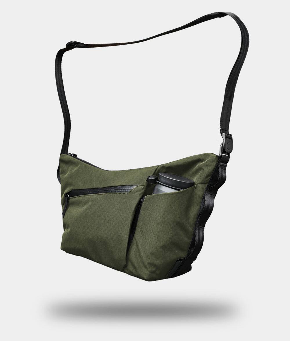 Front. ALPAKA - Flow Satchel 4L Crossbody Bag, Water Resistant Shoulder Bag, Expandable Bottle Pocket, YKK Zippers - Green Axoflux 210D.