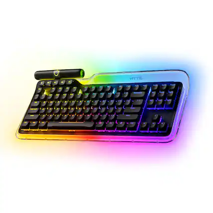The image features a close-up of a colorful keyboard with a rainbow effect. The keyboard has a black background and is illuminated by a light source, creating a visually appealing and unique appearance. The keys are arranged in a standard layout, with the letters and numbers clearly visible. The keyboard is designed to stand out and draw attention, making it a distinctive and eye-catching piece of technology.