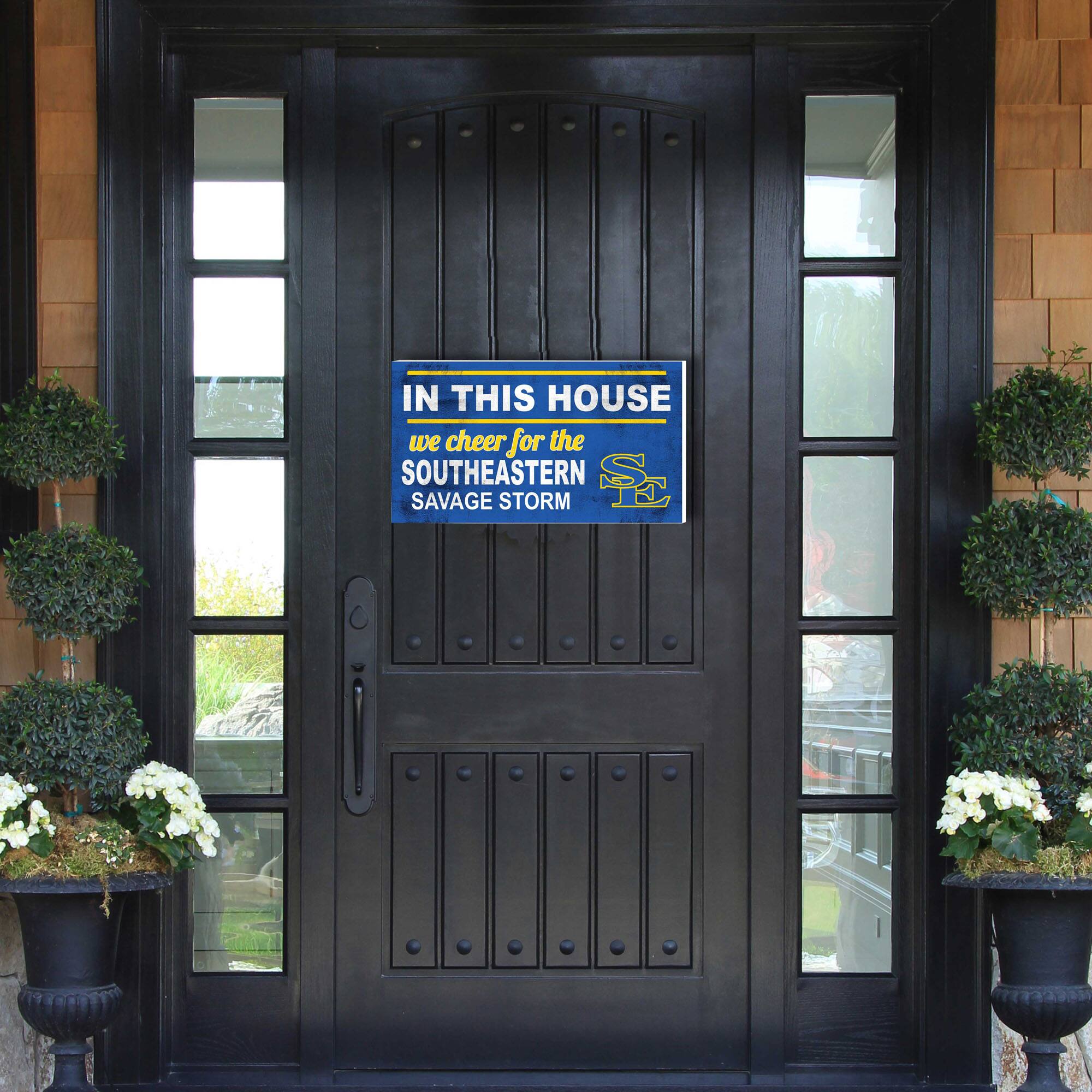 IN THIS HOUSE  
we cheer for the  
SOUTHEASTERN  
SAVAGE STORM