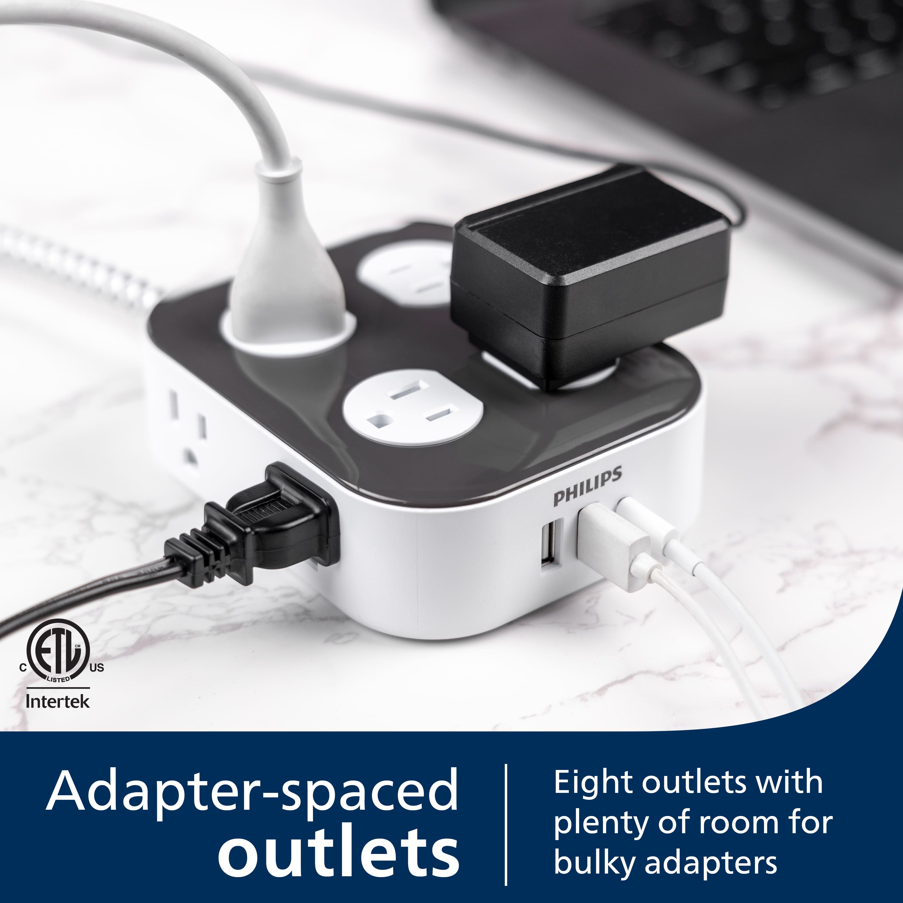 The text on the image reads: "PHILIPS I C ETL US LABTED Intertek Eight outlets with Adapter-spaced of for plenty room for bulky adapters."