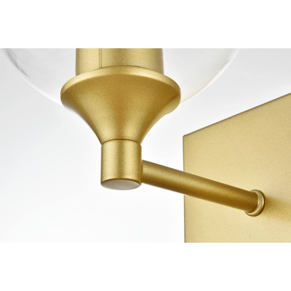 Angle. Living District - Foster 1 light Brass and Clear Bath Sconce - Brass And Clear.