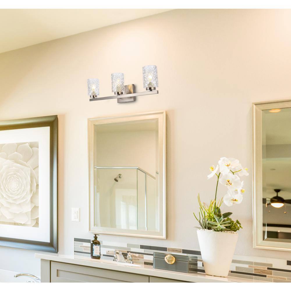 Angle. Living District - Cassie 3 lights bath sconce in satin nickel with clear shade - Satin Nickel And Clear Shade.
