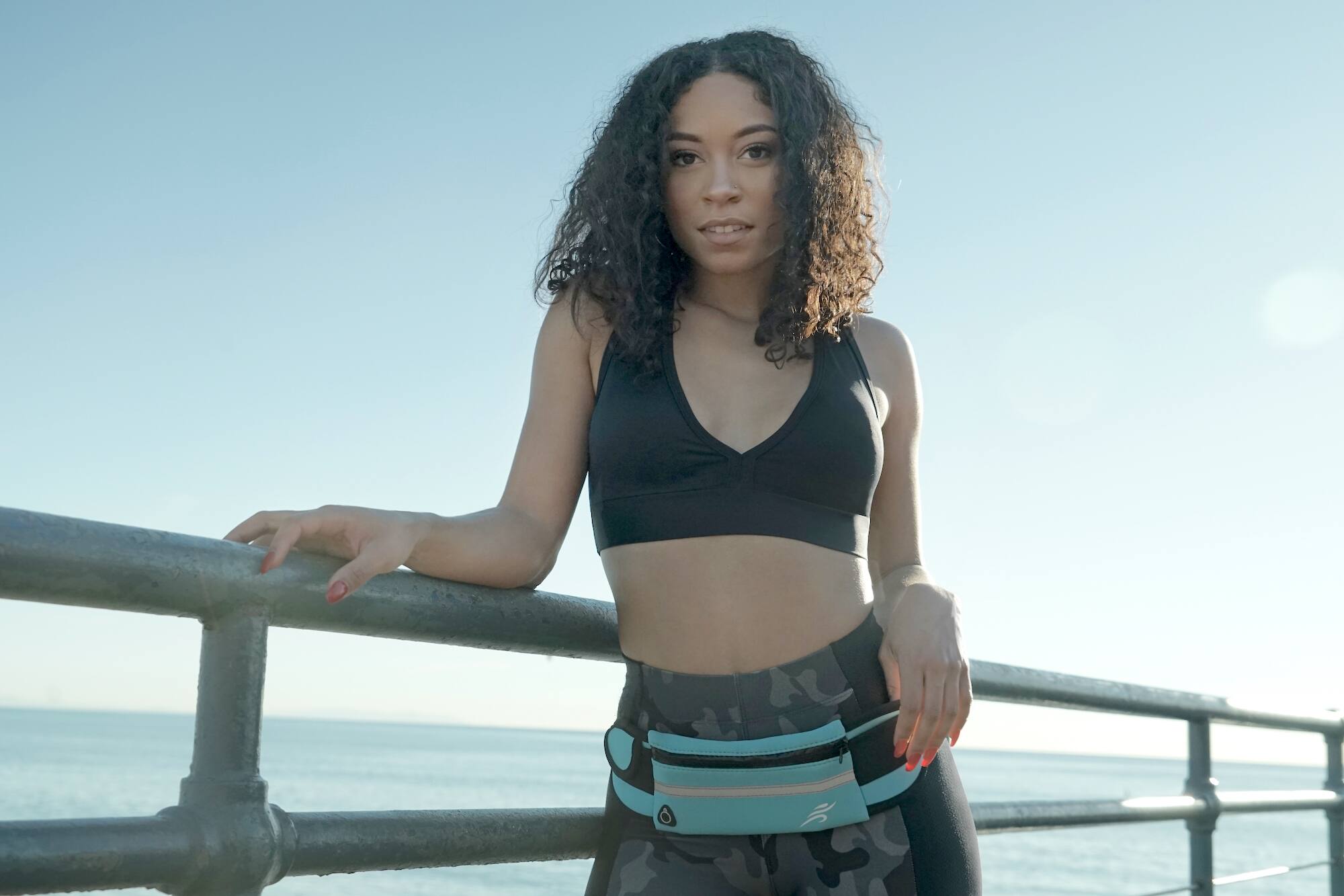 Alt View 2. JupiterGear - Sports Running Belt and Travel Fanny Pack for Jogging, Cycling and Outdoors with Water Resistant Pockets - Sky Blue.