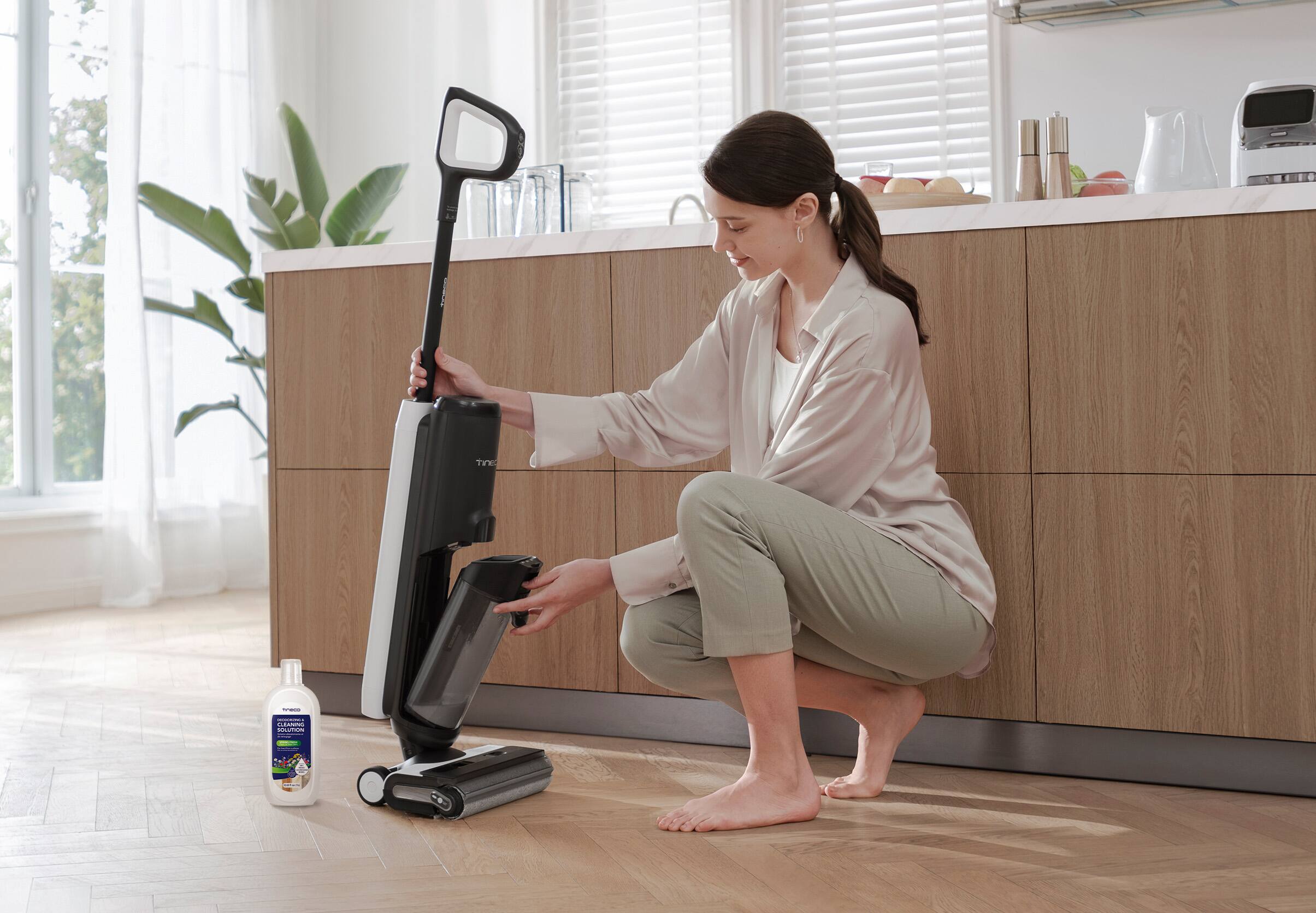 I would add a vacuum to the kitchen.