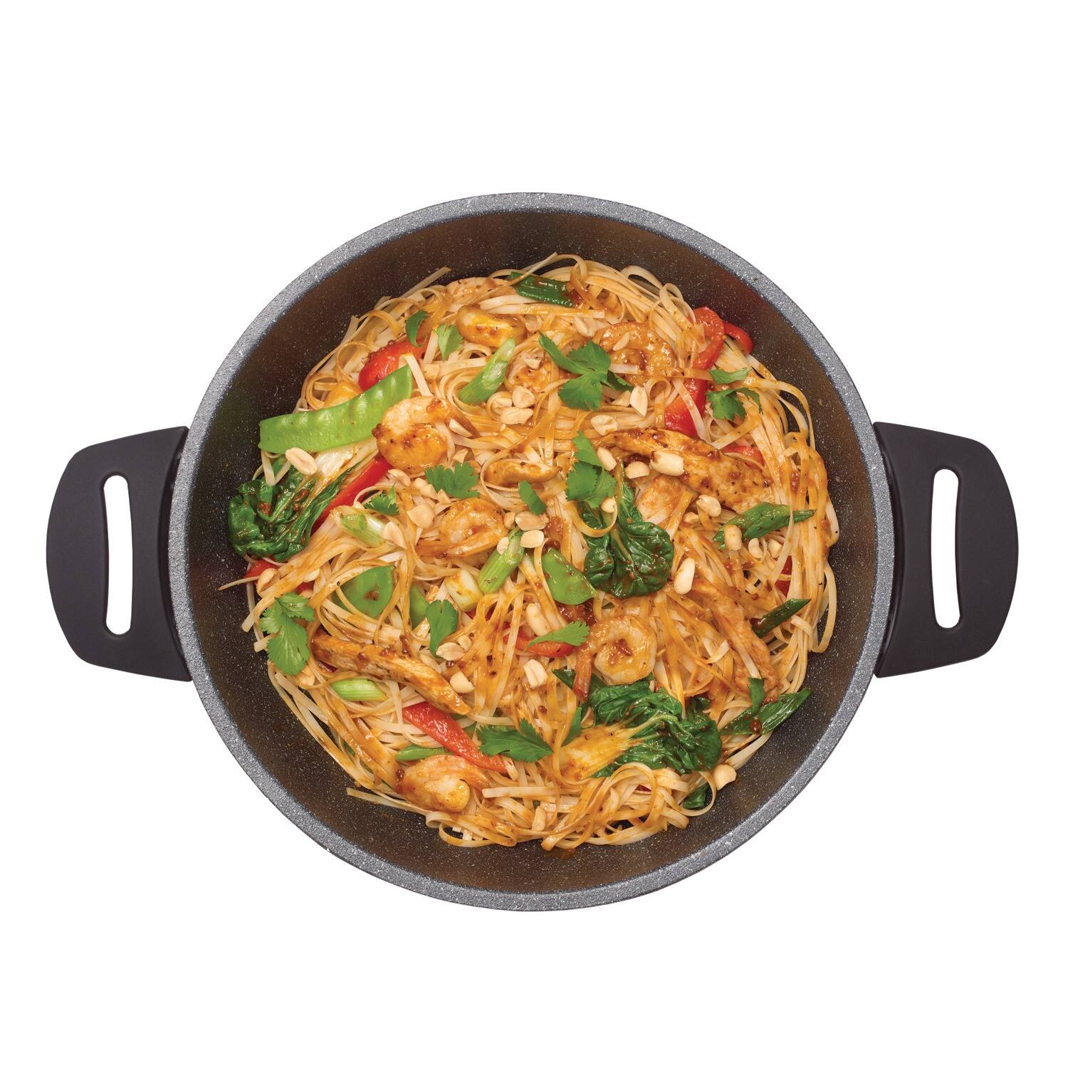 Angle. THE ROCK by Starfrit - The Rock By Starfrit 024404-002-0000 Electric Multi-use Pot With Bakelite Handles - black.