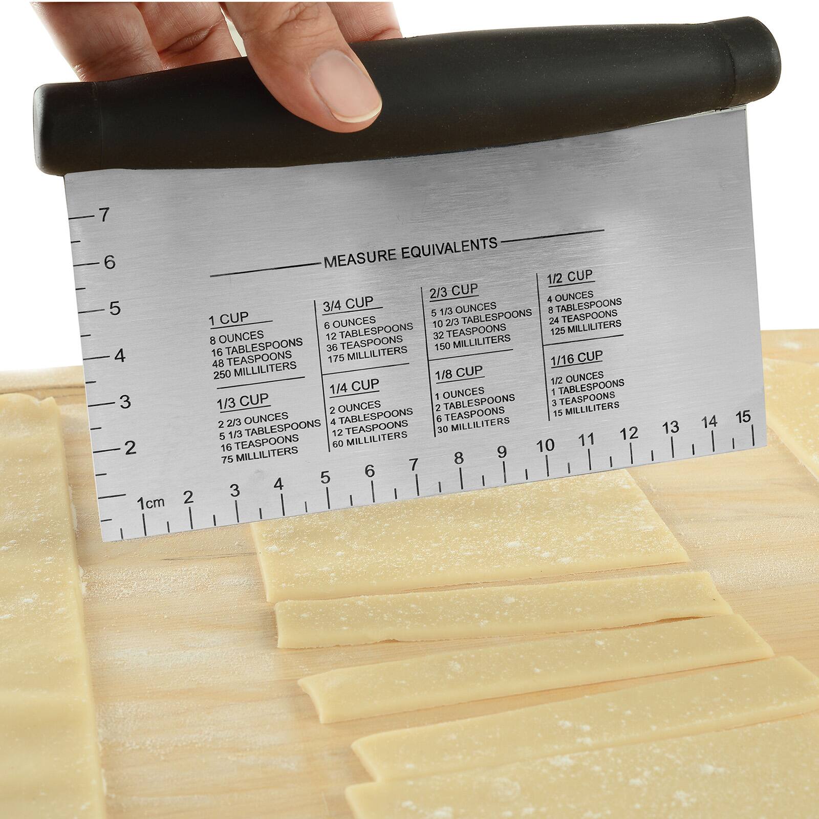 7 6 5 4 3 2 1 cm  
2  
MEASURE EQUIVALENTS  
1 CUP  
8 OUNCES  
16 TABLESPOONS  
48 TEASPOONS  
250 MILLILITERS  

1/3 CUP  
2 2/3 OUNCES  
5 1/3 TABLESPOONS  
16 TEASPOONS  
75 MILLILITERS  

3/4 CUP  
6 OUNCES  
12 TABLESPOONS  
36 TEASPOONS  
175 MILLILITERS  

2/3 CUP  
5 1/3 OUNCES  
8 TABLESPOONS  
24 TEASPOONS  
150 MILLILITERS  

1/2 CUP  
4 OUNCES  
8 TABLESPOONS  
16 TEASPOONS  
125 MILLILITERS  

1/4 CUP  
2 OUNCES  
4 TABLESPOONS  
12 TEASPOONS  
60 MILLILITERS  

1/8 CUP  
1 OUNCE  
2 TABLESPOONS  
6 TEASPOONS  
15 MILLILITERS