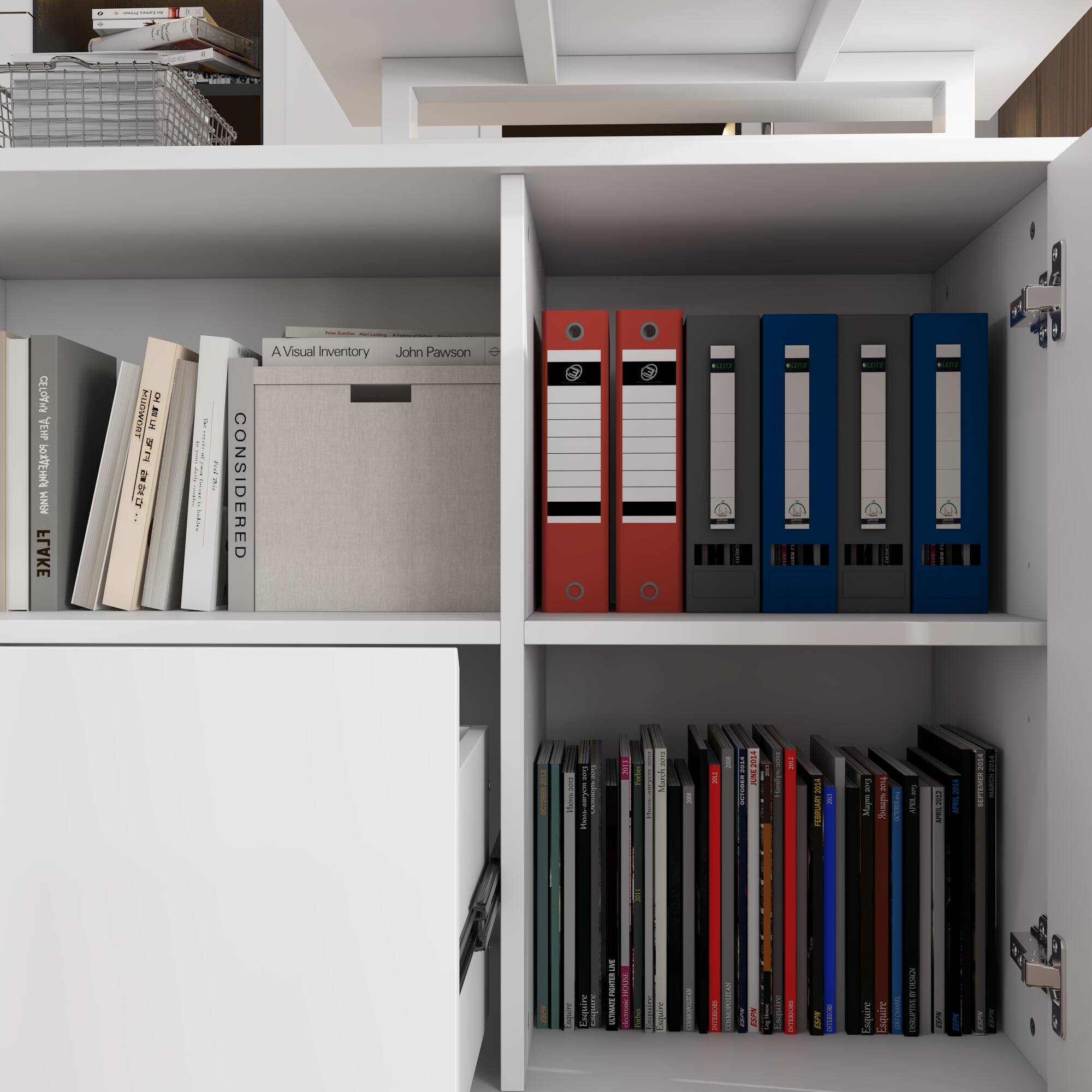 The image features a white bookshelf with various books and binders on it. There are several books of different sizes, with some placed on the left side of the shelf and others on the right side. Additionally, there are two binders, one located in the middle of the shelf and the other on the right side. The books and binders are neatly arranged, creating an organized and visually appealing display.