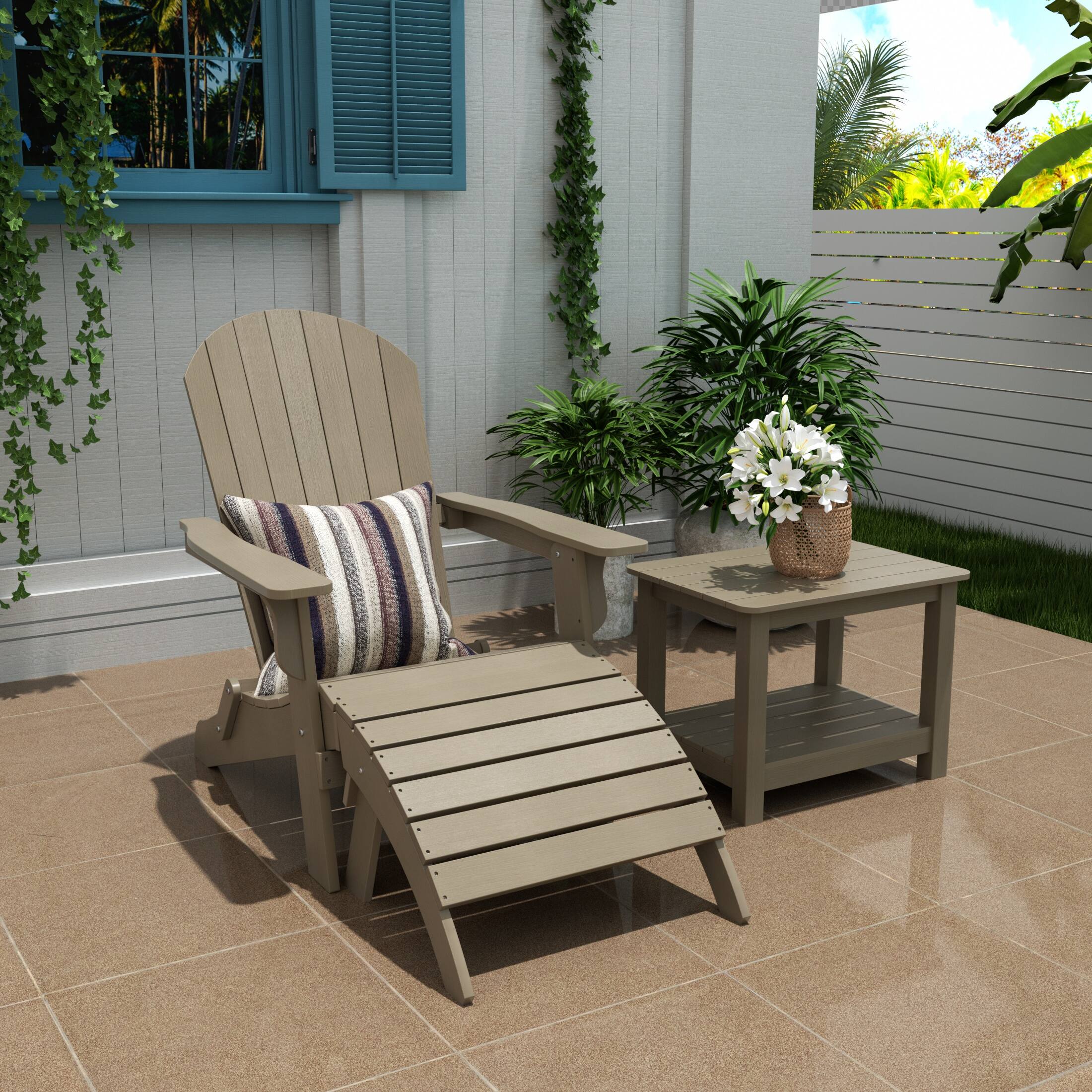 Angle. WestinTrends - WestinTrends Tuscany 3-Piece HIPS Outdoor Folding Adirondack Seashell Chair With Folding Ottoman And Side Table - Taupe.