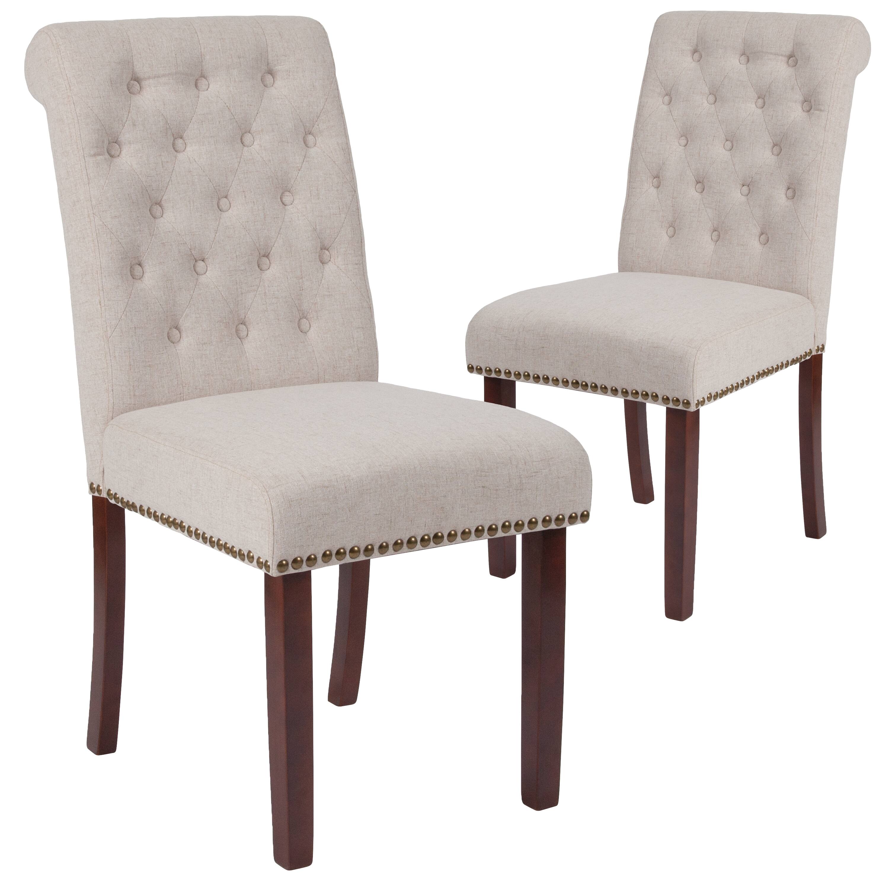 Alt View 1. Emma + Oliver - 2 PK Upholstered Rolled Back Parson's Chair with Nailhead Trim & Finished Frame with Plastic Floor Glides - Beige Fabric.