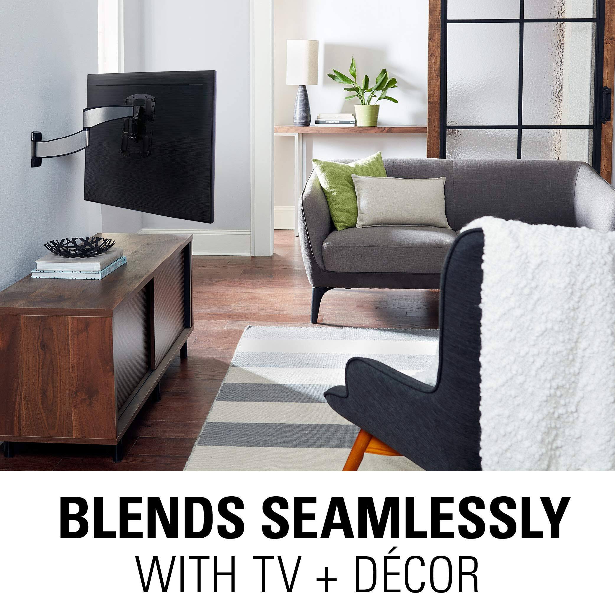 The corrected text is: "Blends seamlessly with TV + décor."