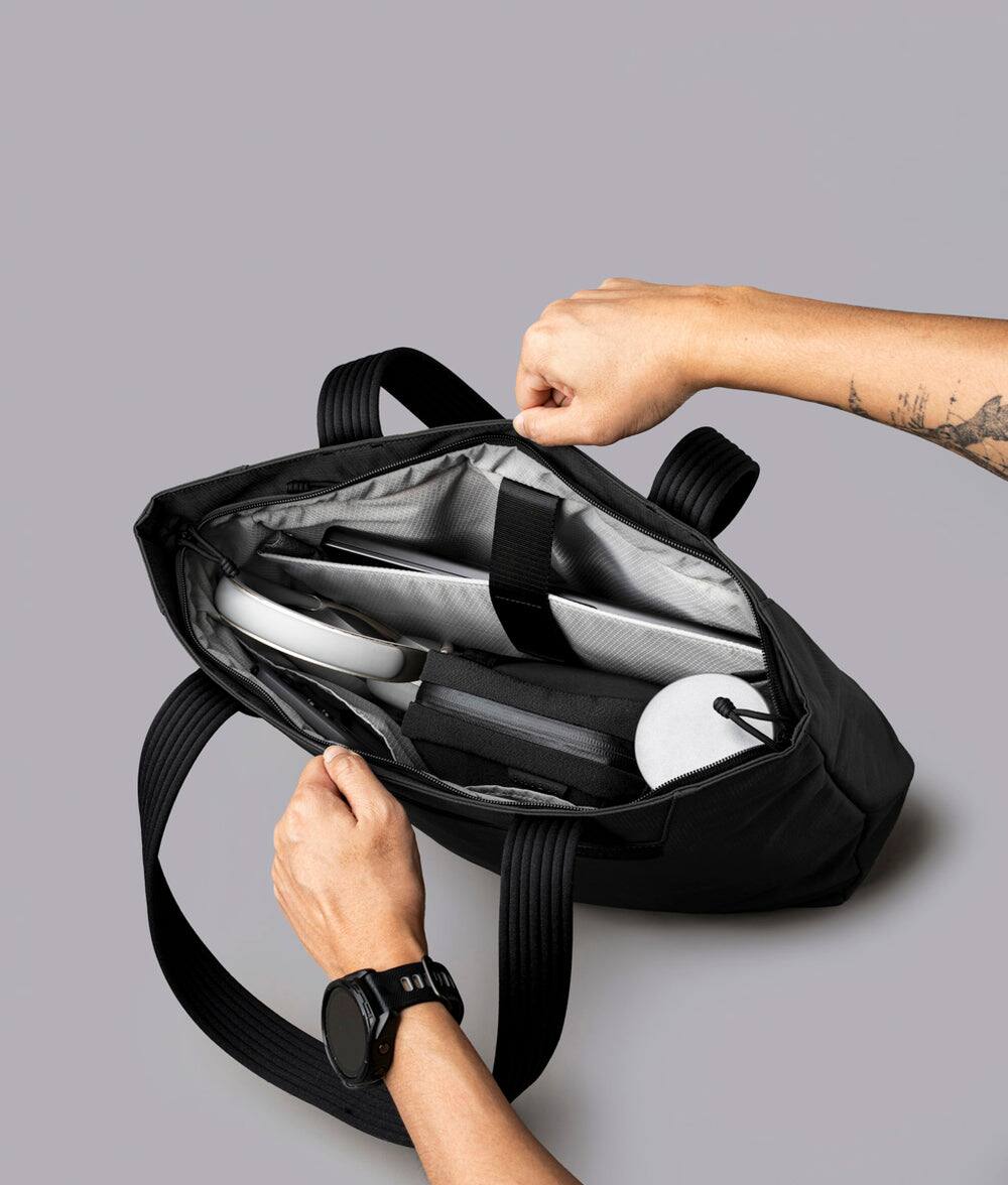 Alt View 5. ALPAKA - Flight Tote (L) Laptop Tote Bag for Work, Large Tote Bag Fits 16" MacBook Pro, Water Bottle Pocket, Luggage Pass-Through - Black Axoflux 400D.