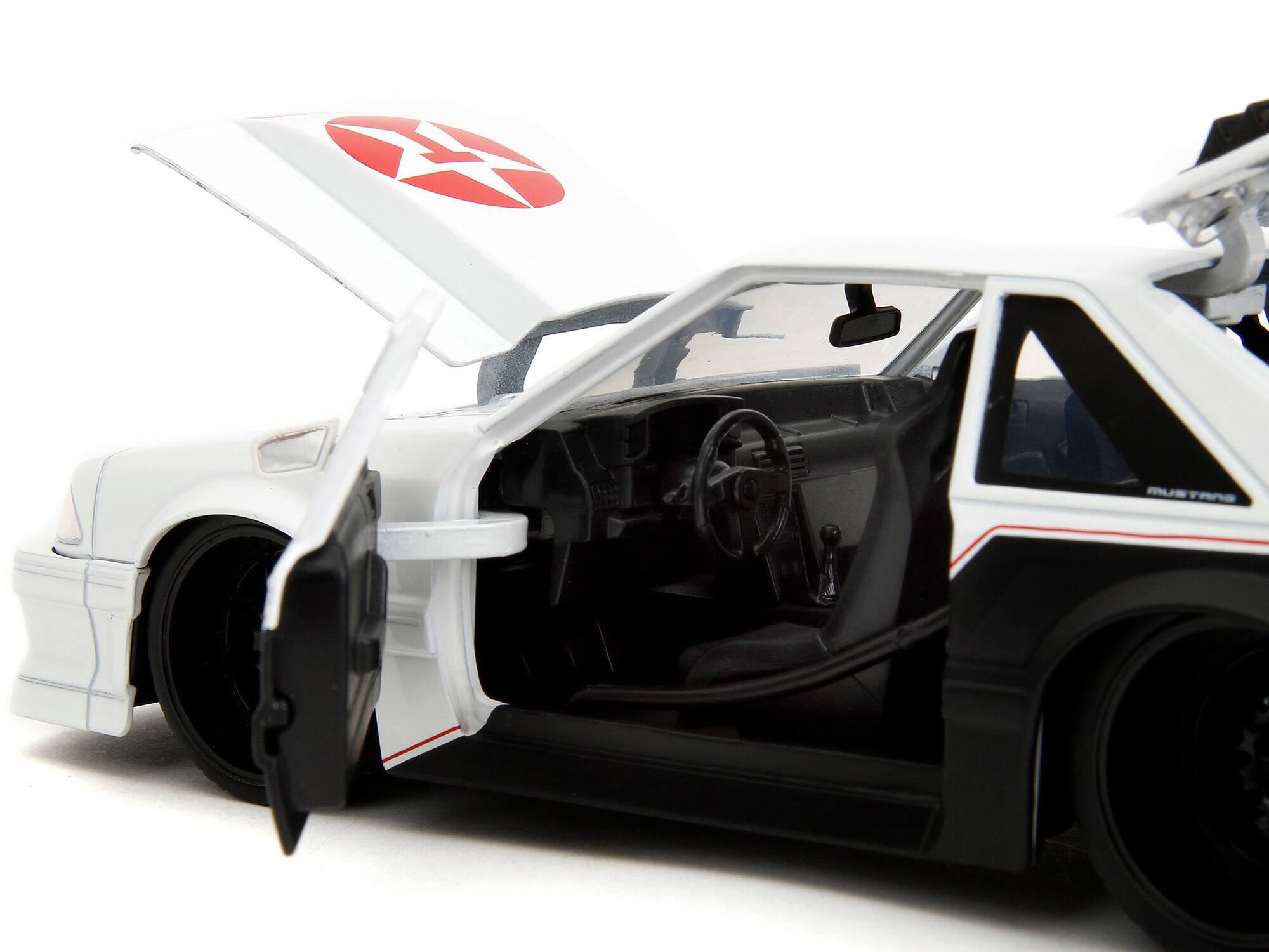 Left. Jada - 1989 Ford Mustang GT "Texaco" White and Matt Black with Graphics "Bigtime Muscle" Series 1/24 Diecast Model Car by Jada - White And Matt Black.