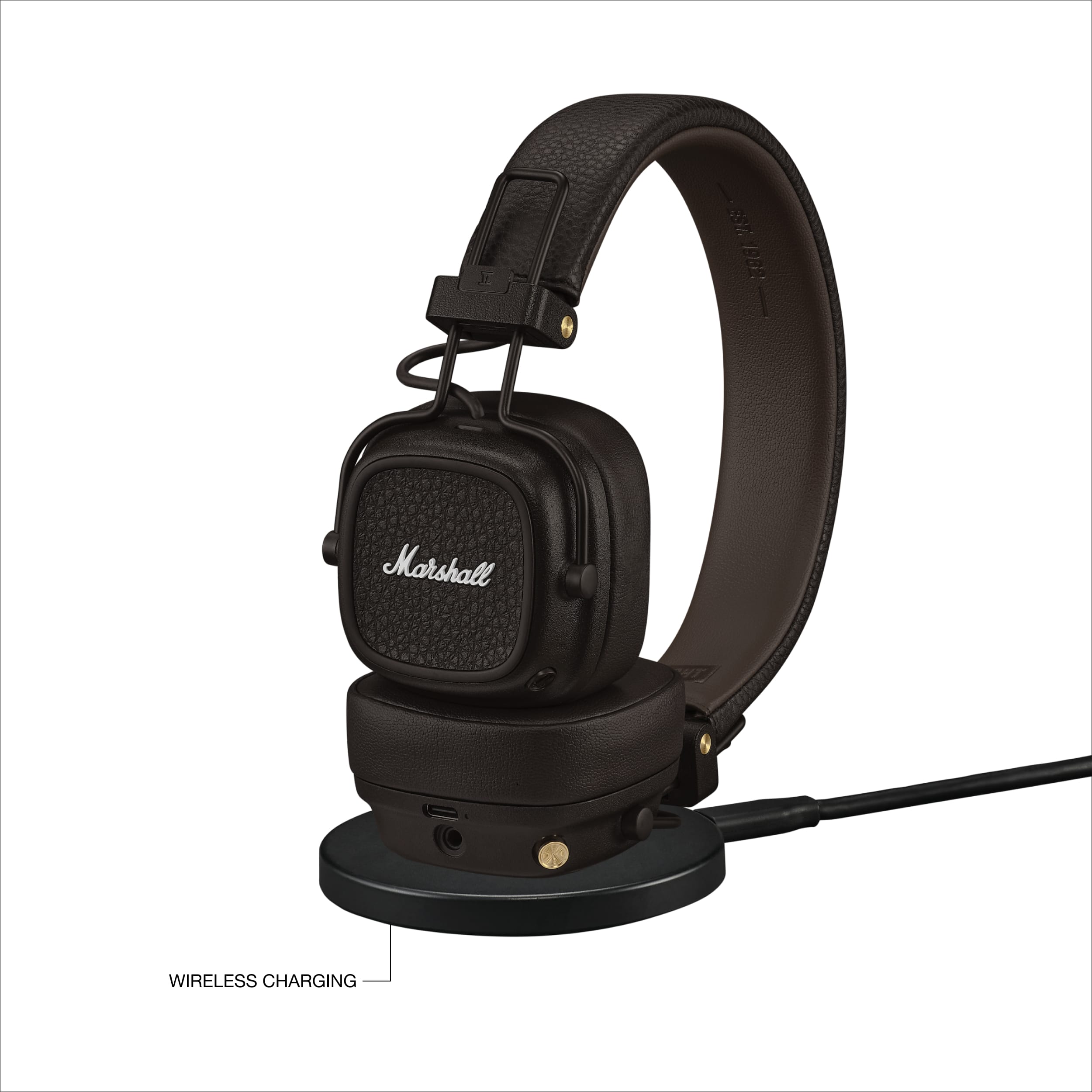 The Marshall headphones are wireless charging, which means they can be charged without the need for a physical connection to a charger. This feature allows for a more convenient and hassle-free charging experience. The headphones are designed with a brown leather case and have a black and gold color scheme. They are equipped with a built-in microphone and a 3.5mm jack for plugging in a device. The headphones are also designed to provide a comfortable fit and a high-quality listening experience.