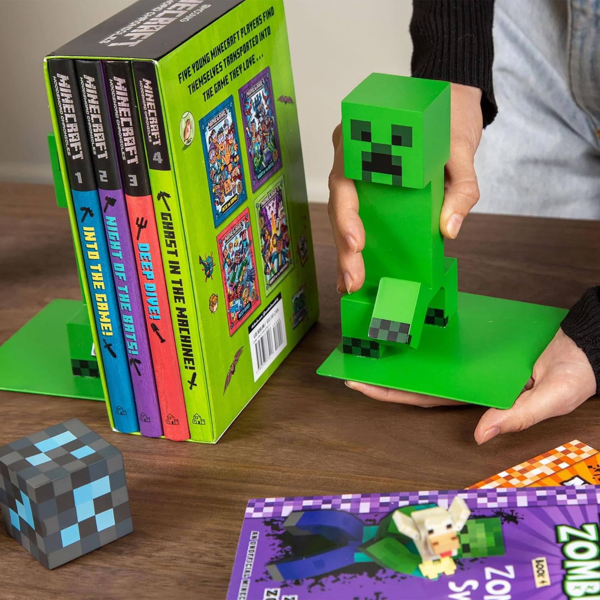 Sure, here is the corrected and grouped text from the image:

---

**Minecraft**

1. **Into the Deep**
2. **Night of the Ghouls**
3. **The Machine**
4. **The Curse**

**Minecraft: The Game**

Five young Minecraft players find themselves transported into the game they love...

---

**Zombie**

---

**Minecraft: The Game**

Five young Minecraft players find themselves transported into the game they love...

---

**Minecraft: The Game**

Five young Minecraft players find themselves transported into the game they love...

---

**Minecraft: The Game**

Five young Minecraft players find themselves transported into the game they love...

---

**Minecraft: The Game**

Five young Minecraft players find themselves transported into the game they love...

---

**Minecraft: The Game**

Five young Minecraft players find themselves transported into the game they love...

---

**Minecraft: The Game**

Five young Minecraft players find themselves transported into the game they love...

---

**Minecraft: The Game**

Five young Minecraft players find themselves transported into the game they love...

---

**Minecraft: The Game**

Five young Minecraft players find themselves transported into the game they love...

---

**Minecraft: The Game**

Five young Minecraft players find themselves transported into