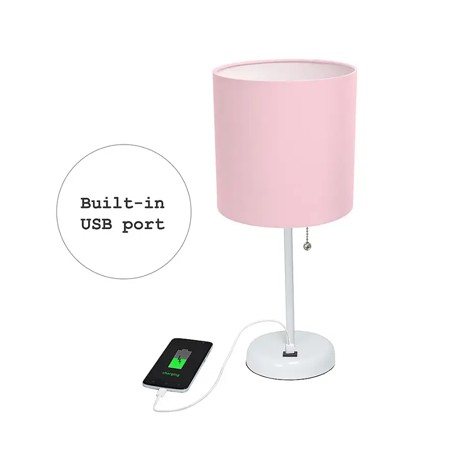 The image features a pink lamp with a built-in USB port. The lamp is connected to a cell phone, which is charging. The USB port allows for easy charging of devices without the need for additional cords or chargers. The lamp is a convenient and stylish solution for keeping devices charged and organized.