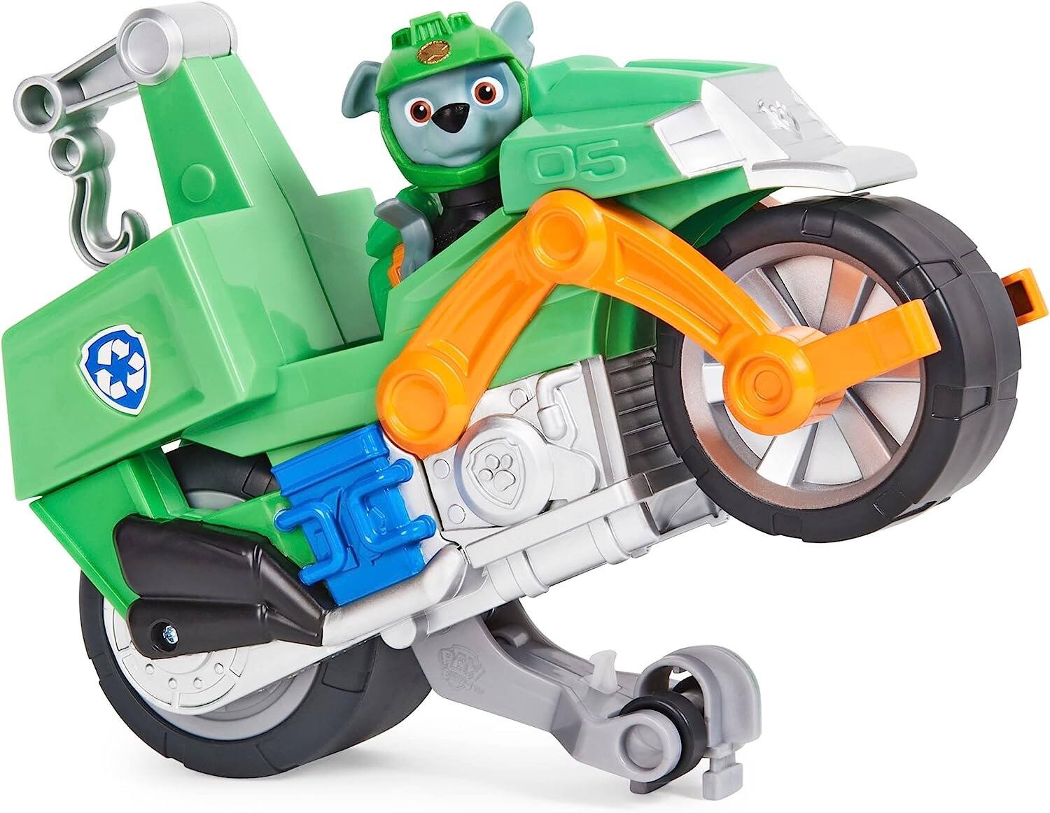Alt View 1. Paw Patrol - Paw Patrol Moto Pups Rocky Deluxe Pull-Back Motorcycle with Wheelie Feature and Figure, Ages 3+ - Multicolor.