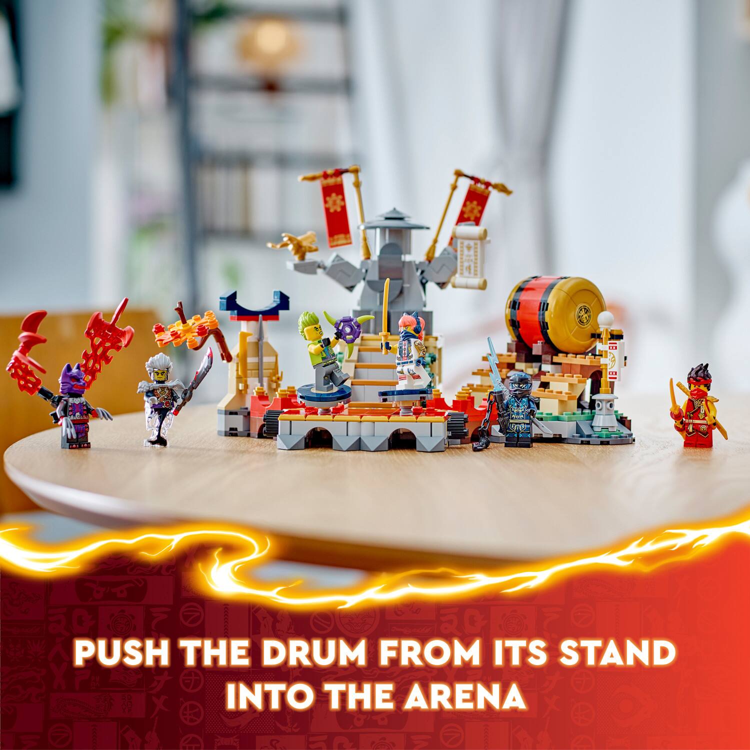Push the drum from its stand into the arena.