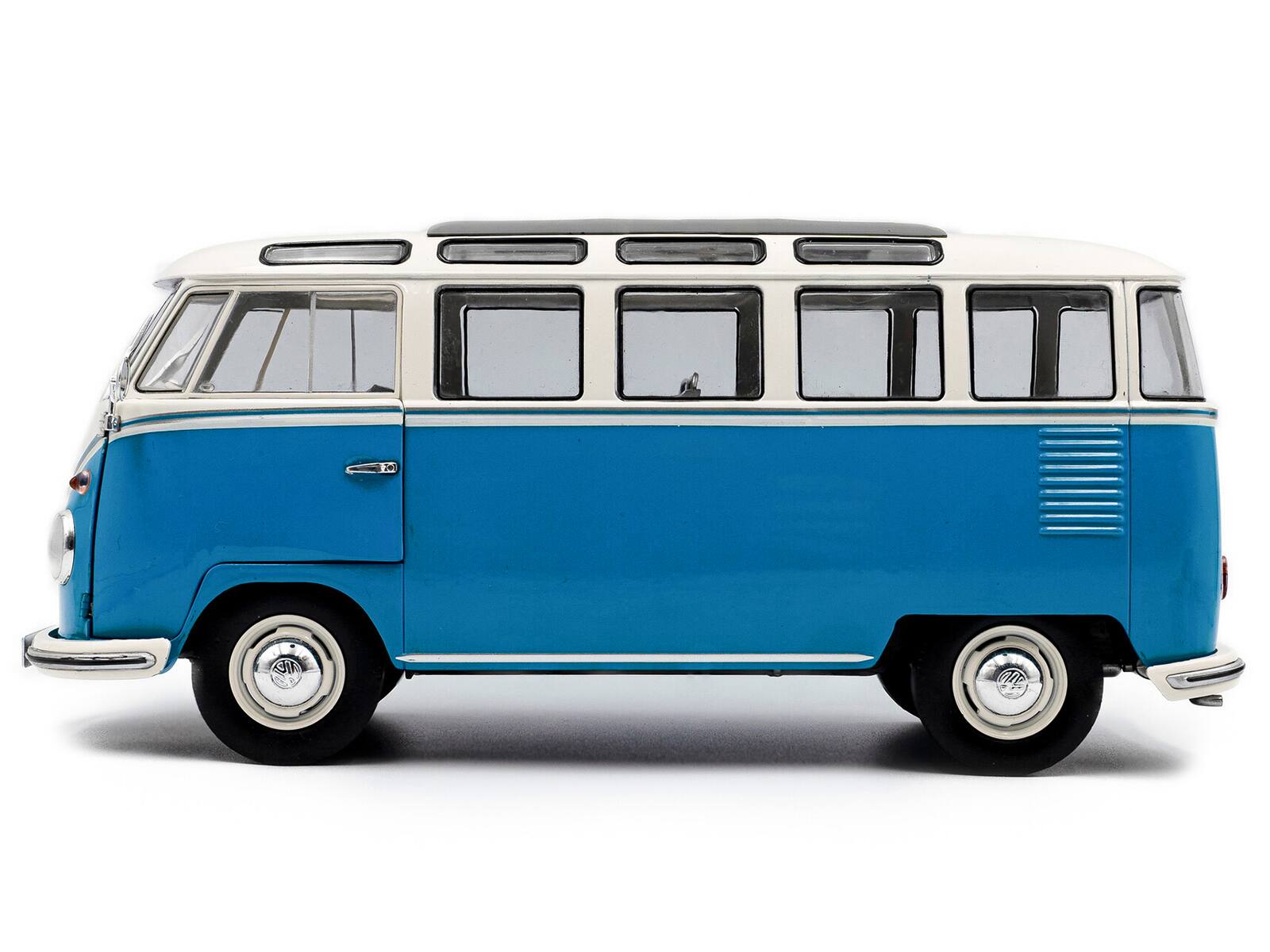 Left. Solido - 1962 Volkswagen T1 Samba Bus Baby Blue and White 1/18 Diecast Model Car by Solido - Baby Blue and White.